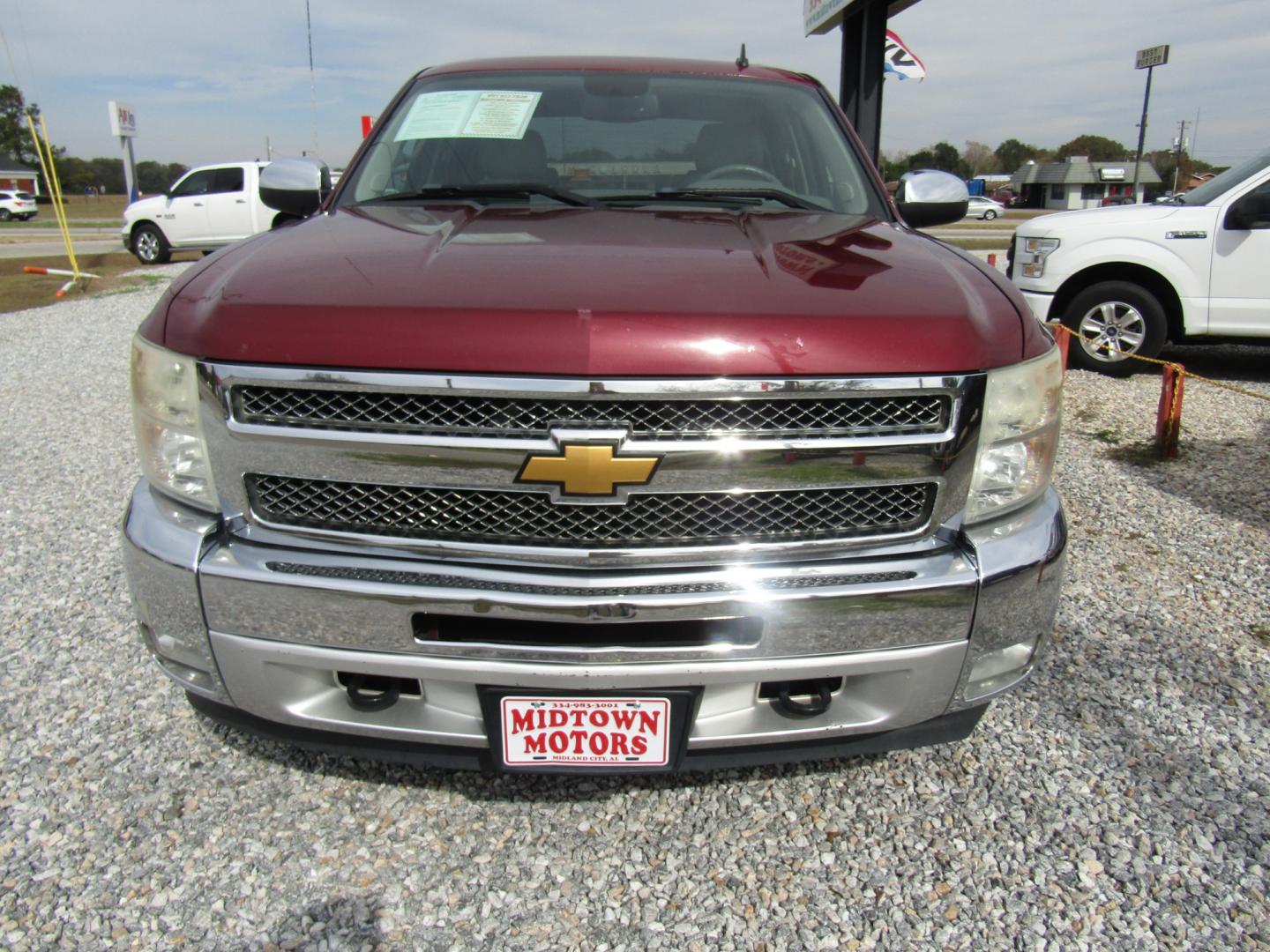 2013 Burgandy /Gray Chevrolet Silverado 1500 LT Crew Cab 4WD (3GCPKSE78DG) with an 5.3L V8 OHV 16V FFV engine, Automatic transmission, located at 15016 S Hwy 231, Midland City, AL, 36350, (334) 983-3001, 31.306210, -85.495277 - Photo#1