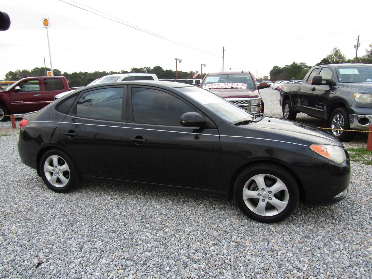 2008 Black Hyundai Elantra GLS (KMHDU46D38U) with an 2.0L L4 DOHC 16V engine, Automatic transmission, located at 15016 S Hwy 231, Midland City, AL, 36350, (334) 983-3001, 31.306210, -85.495277 - Photo#0