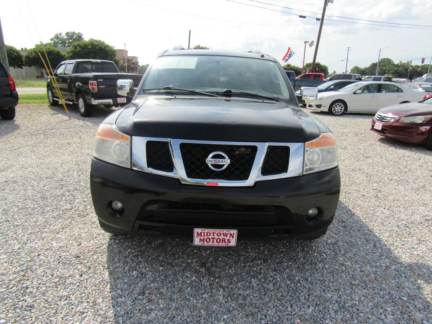 2011 Brown Nissan Armada SL 2WD (5N1BA0ND2BN) with an 5.6L V8 DOHC 32V FFV engine, Automatic transmission, located at 15016 S Hwy 231, Midland City, AL, 36350, (334) 983-3001, 31.306210, -85.495277 - Photo#1