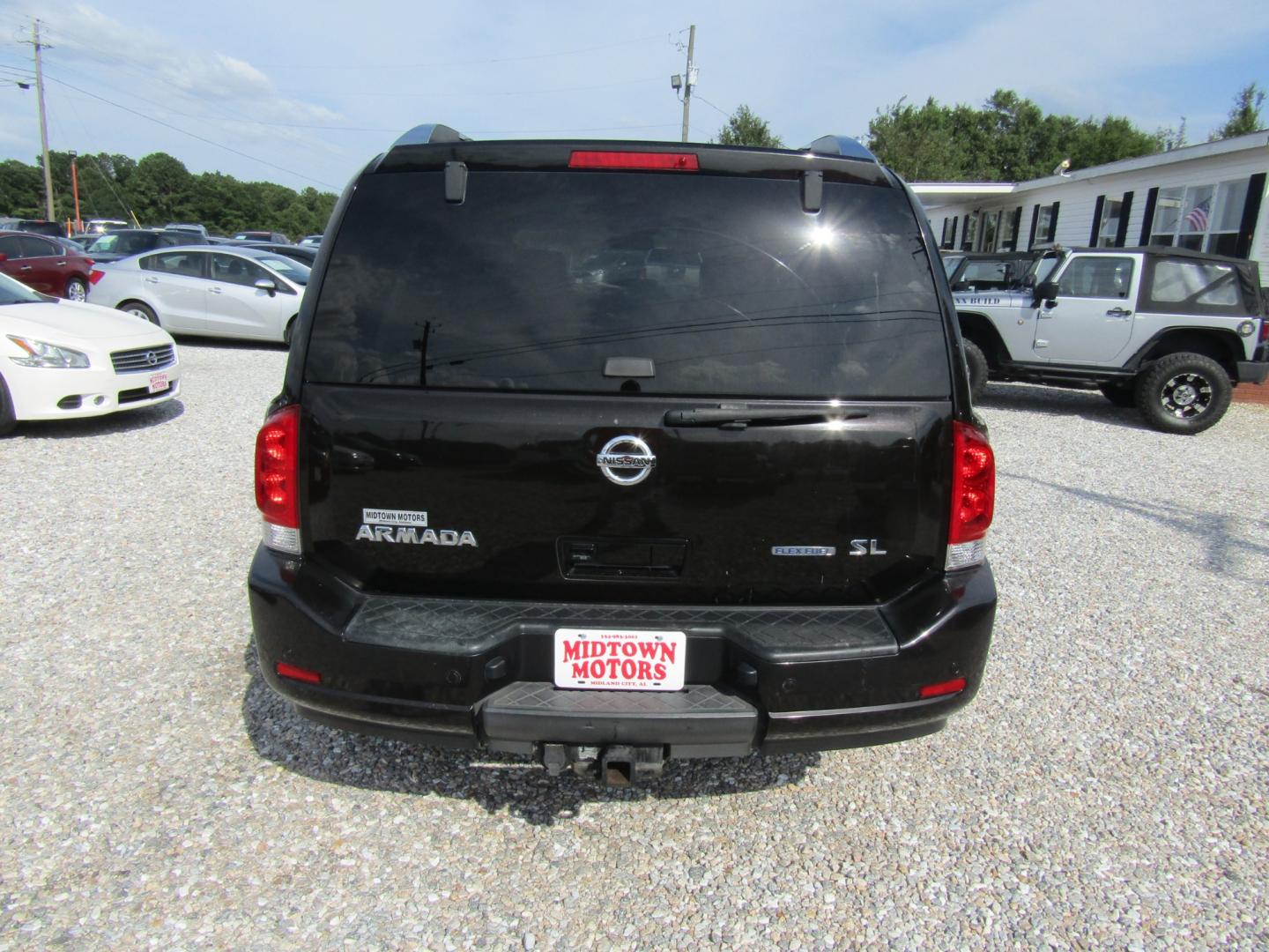 2011 Brown Nissan Armada SL 2WD (5N1BA0ND2BN) with an 5.6L V8 DOHC 32V FFV engine, Automatic transmission, located at 15016 S Hwy 231, Midland City, AL, 36350, (334) 983-3001, 31.306210, -85.495277 - Photo#6