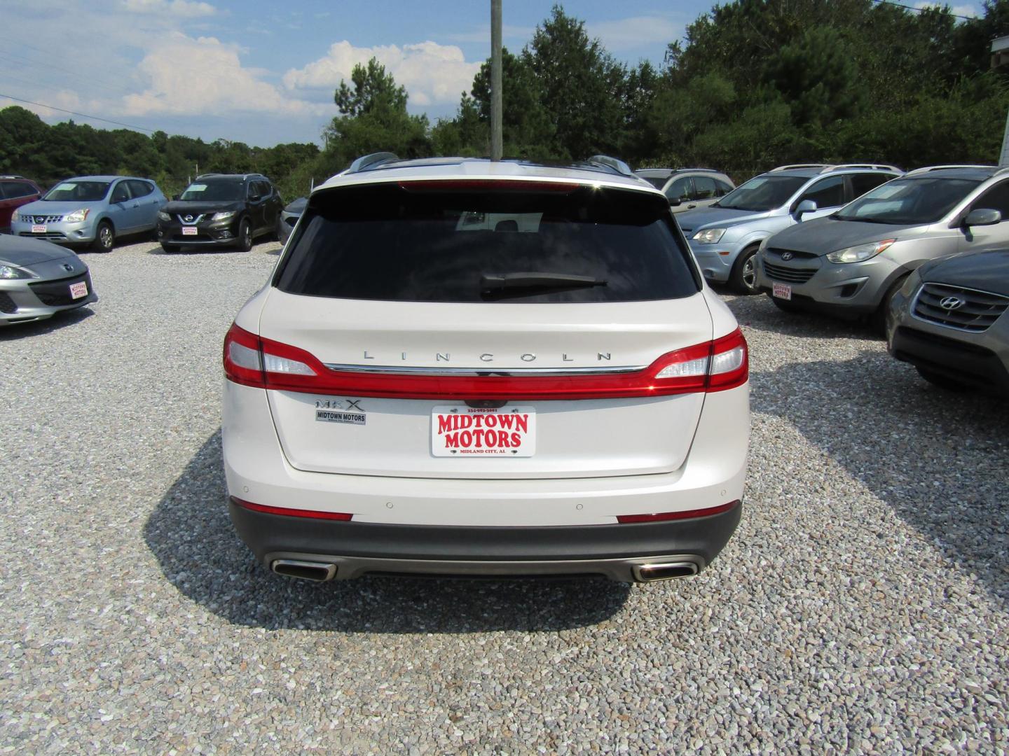 2018 White /Brown Lincoln MKX Reserve (2LMPJ6LR1JB) with an 3.7L V6 DOHC 24V engine, Automatic transmission, located at 15016 S Hwy 231, Midland City, AL, 36350, (334) 983-3001, 31.306210, -85.495277 - Photo#7