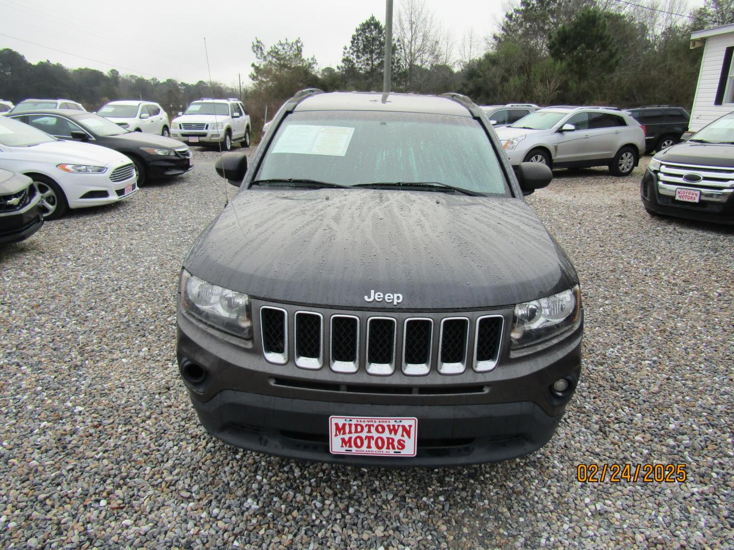 2014 Gray Jeep Compass Sport FWD (1C4NJCBB0ED) with an 2.4L L4 DOHC 16V engine, Automatic transmission, located at 15016 S Hwy 231, Midland City, AL, 36350, (334) 983-3001, 31.306210, -85.495277 - Photo#1