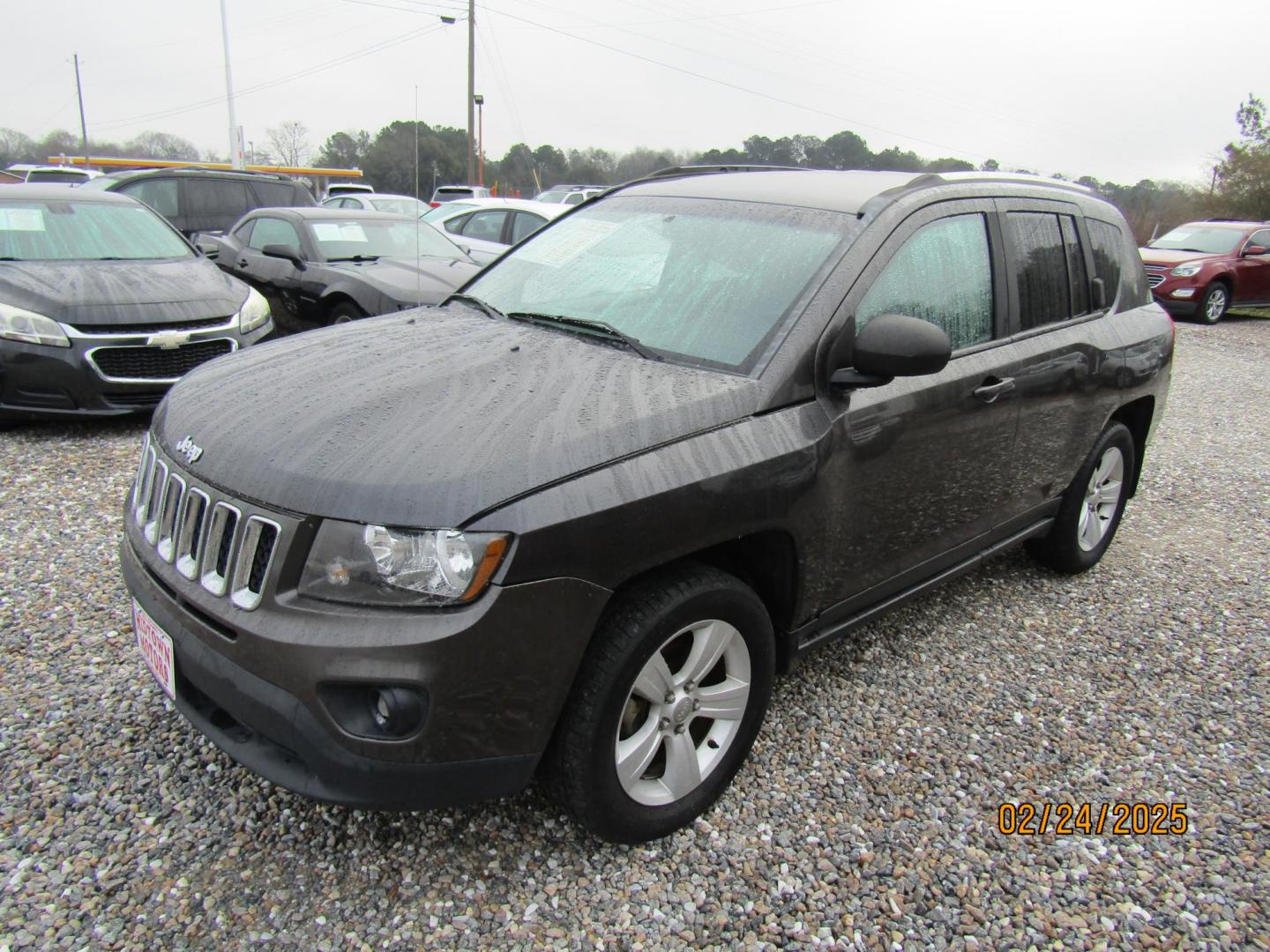 2014 Gray Jeep Compass Sport FWD (1C4NJCBB0ED) with an 2.4L L4 DOHC 16V engine, Automatic transmission, located at 15016 S Hwy 231, Midland City, AL, 36350, (334) 983-3001, 31.306210, -85.495277 - Photo#2