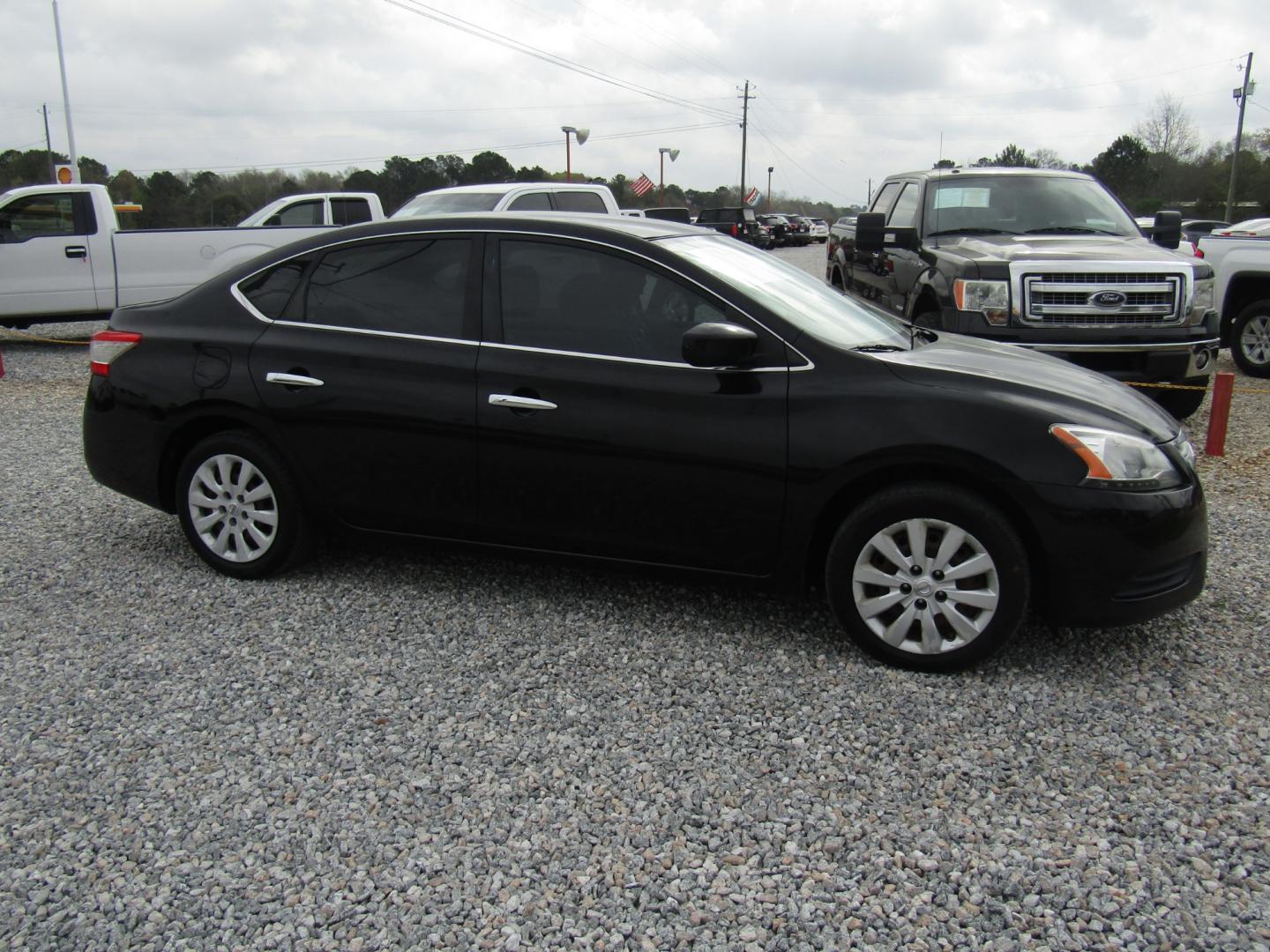 2015 Black Nissan Sentra S 6MT (3N1AB7APXFL) with an 1.8L L4 SFI DOHC 16V engine, Automatic transmission, located at 15016 S Hwy 231, Midland City, AL, 36350, (334) 983-3001, 31.306210, -85.495277 - Photo#0