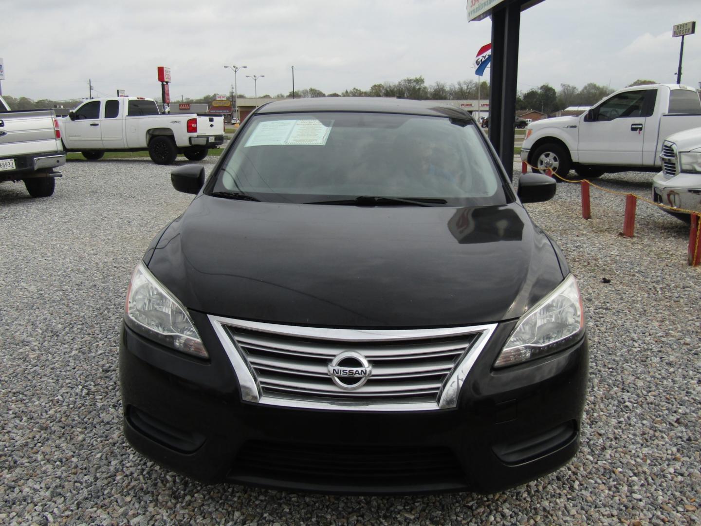 2015 Black Nissan Sentra S 6MT (3N1AB7APXFL) with an 1.8L L4 SFI DOHC 16V engine, Automatic transmission, located at 15016 S Hwy 231, Midland City, AL, 36350, (334) 983-3001, 31.306210, -85.495277 - Photo#1