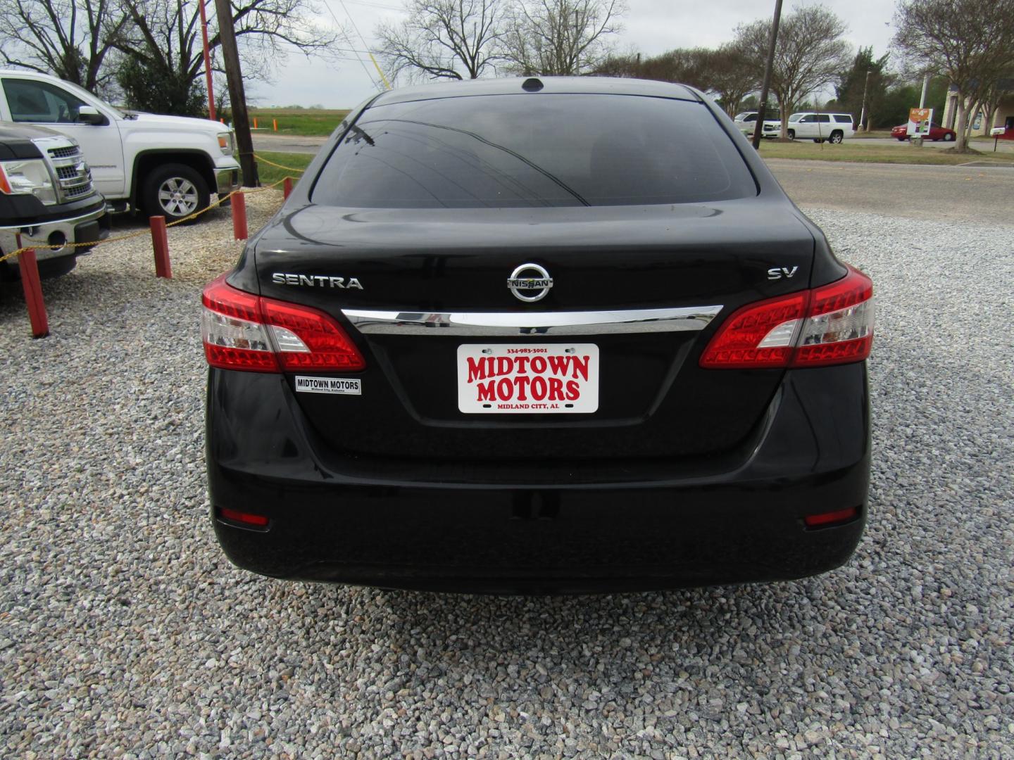 2015 Black Nissan Sentra S 6MT (3N1AB7APXFL) with an 1.8L L4 SFI DOHC 16V engine, Automatic transmission, located at 15016 S Hwy 231, Midland City, AL, 36350, (334) 983-3001, 31.306210, -85.495277 - Photo#7