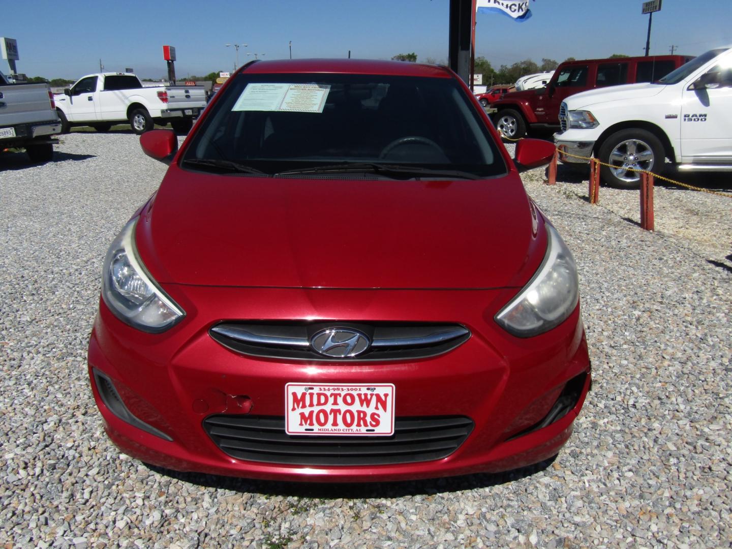 2015 Red /Gray Hyundai Accent GLS 4-Door 6A (KMHCT4AE0FU) with an 1.6L L4 DOHC 16V engine, Automatic transmission, located at 15016 S Hwy 231, Midland City, AL, 36350, (334) 983-3001, 31.306210, -85.495277 - Photo#1