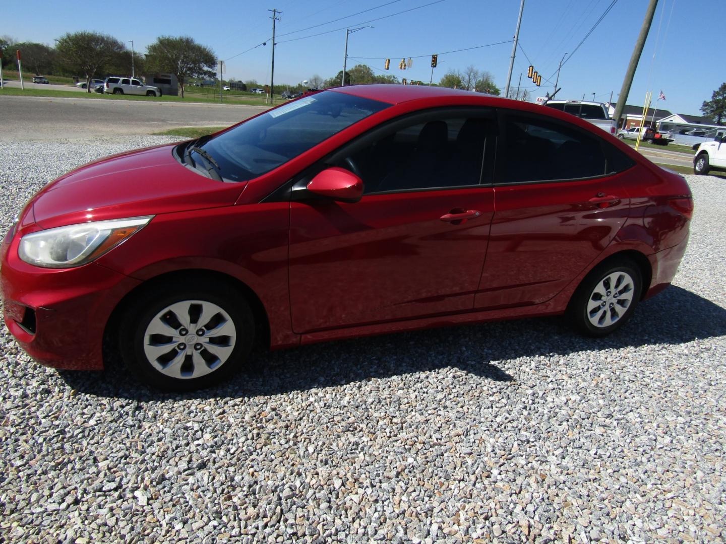 2015 Red /Gray Hyundai Accent GLS 4-Door 6A (KMHCT4AE0FU) with an 1.6L L4 DOHC 16V engine, Automatic transmission, located at 15016 S Hwy 231, Midland City, AL, 36350, (334) 983-3001, 31.306210, -85.495277 - Photo#2