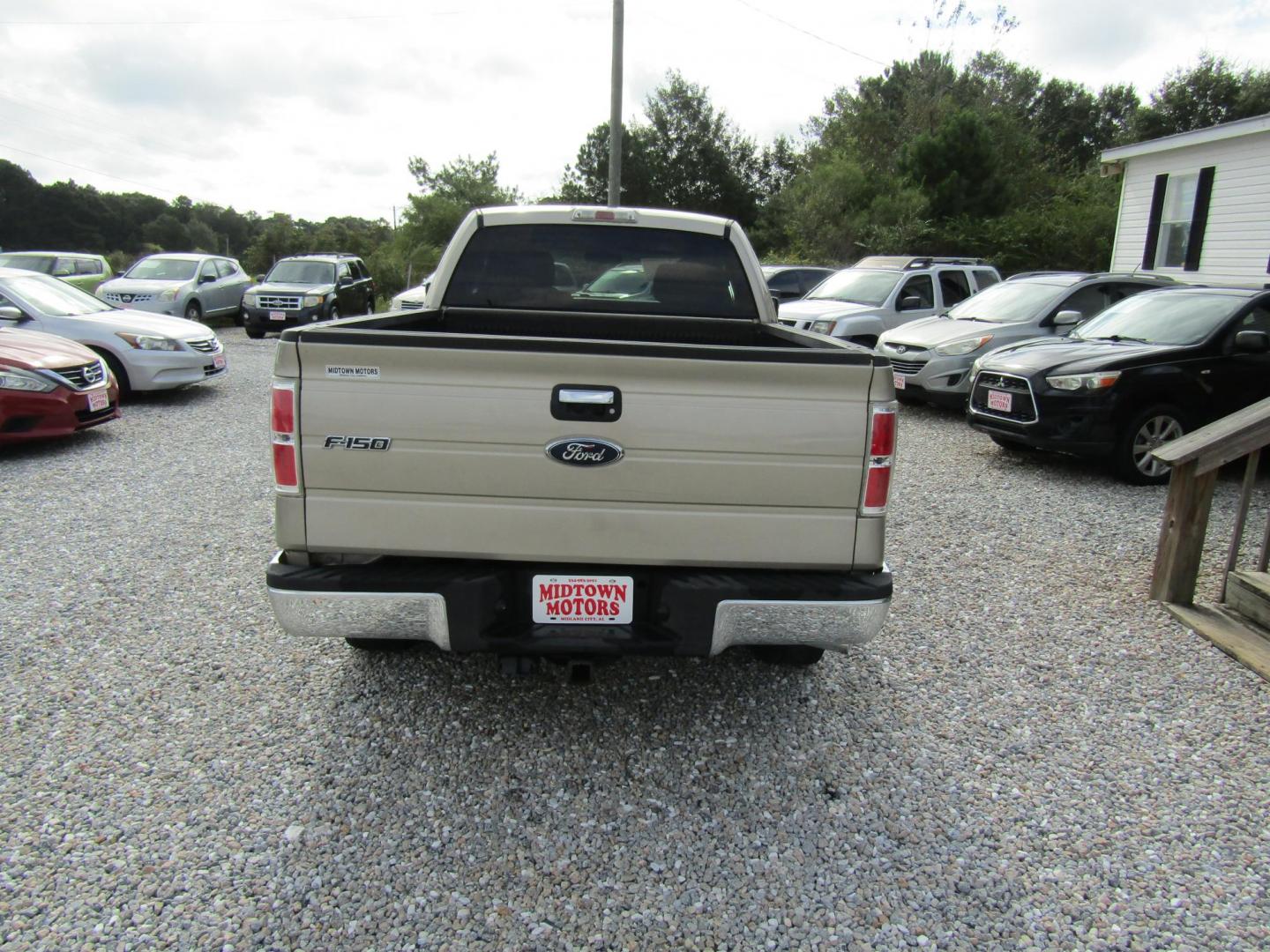 2010 Gold Ford F-150 Lariat SuperCab 6.5-ft. Bed 2WD (1FTEX1C87AF) with an 4.6L V8 SOHC 24V engine, Automatic transmission, located at 15016 S Hwy 231, Midland City, AL, 36350, (334) 983-3001, 31.306210, -85.495277 - Photo#6