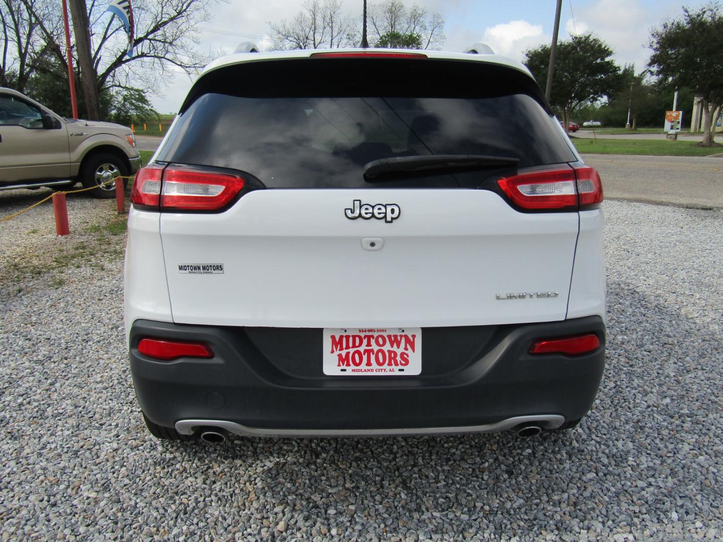 2014 White Jeep Cherokee Limited FWD (1C4PJLDS3EW) with an 3.2L V6 DOHC 24V engine, Automatic transmission, located at 15016 S Hwy 231, Midland City, AL, 36350, (334) 983-3001, 31.306210, -85.495277 - Photo#6