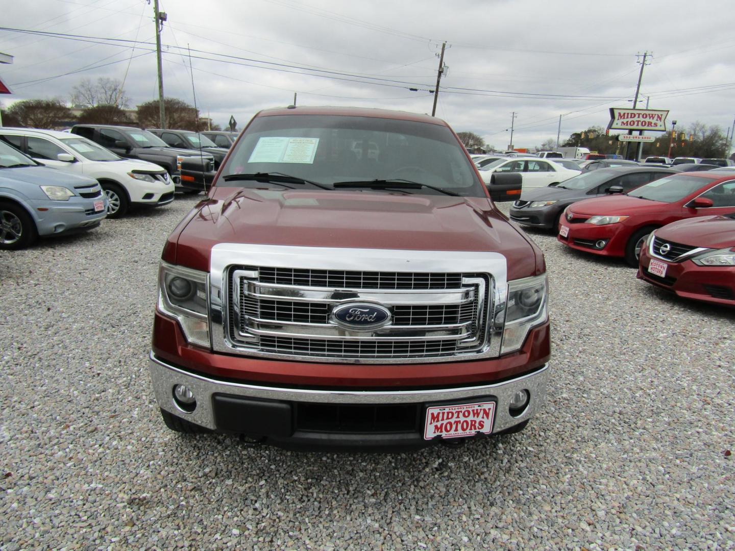 2014 Maroon Ford F-150 FX4 SuperCrew 5.5-ft. Bed 4WD (1FTFW1ET6EK) with an 3.5L V6 TURBO engine, Automatic transmission, located at 15016 S Hwy 231, Midland City, AL, 36350, (334) 983-3001, 31.306210, -85.495277 - Photo#1