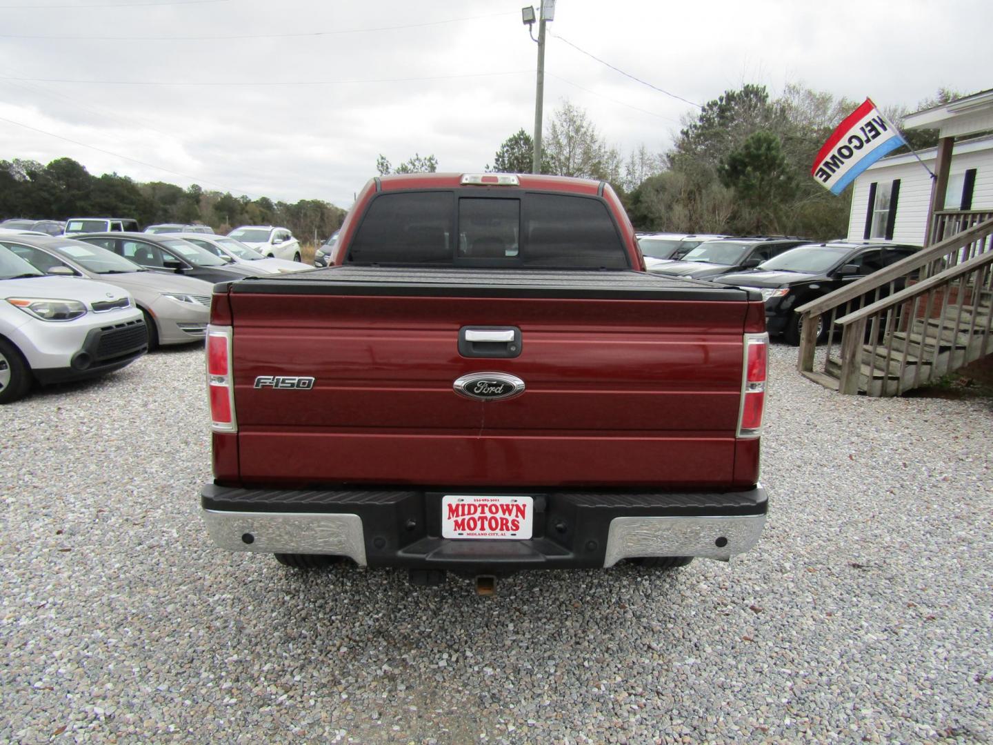 2014 Maroon Ford F-150 FX4 SuperCrew 5.5-ft. Bed 4WD (1FTFW1ET6EK) with an 3.5L V6 TURBO engine, Automatic transmission, located at 15016 S Hwy 231, Midland City, AL, 36350, (334) 983-3001, 31.306210, -85.495277 - Photo#6