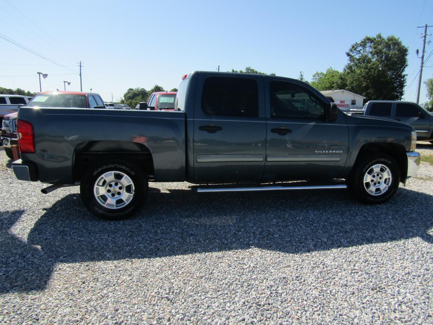 2012 Blue Chevrolet Silverado 1500 LT Crew Cab 2WD (3GCPCSE05CG) with an 5.3L V8 OHV 16V FFV engine, Automatic transmission, located at 15016 S Hwy 231, Midland City, AL, 36350, (334) 983-3001, 31.306210, -85.495277 - Photo#7