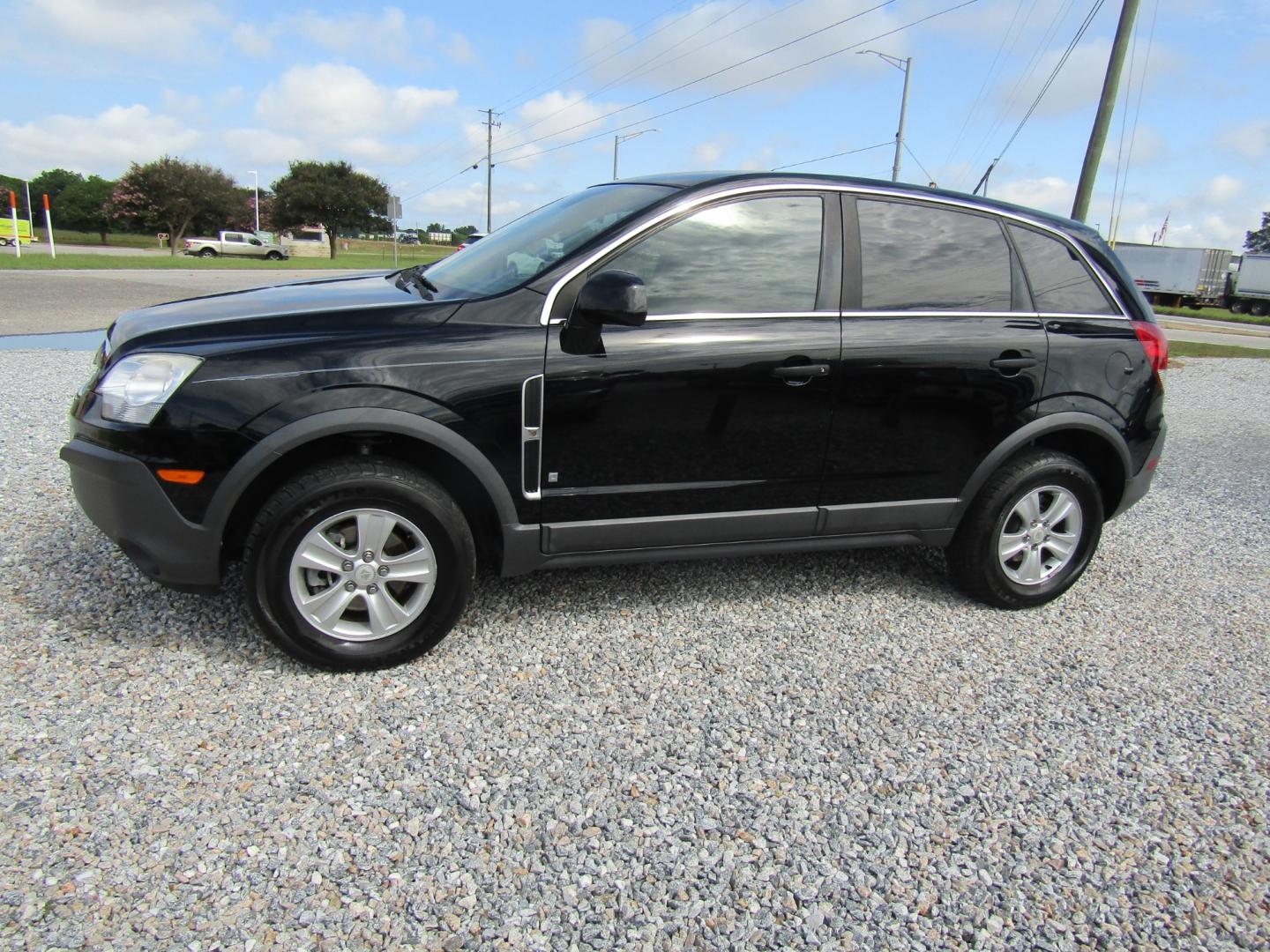 2009 Black /Black Saturn VUE FWD XE (3GSCL33P29S) with an 2.4L L4 DOHC 16V engine, Automatic transmission, located at 15016 S Hwy 231, Midland City, AL, 36350, (334) 983-3001, 31.306210, -85.495277 - Photo#2