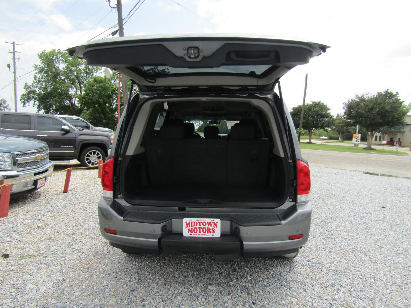 2013 Gray Nissan Armada SL 2WD (5N1BA0ND7DN) with an 5.6L V8 DOHC 32V FFV engine, Automatic transmission, located at 15016 S Hwy 231, Midland City, AL, 36350, (334) 983-3001, 31.306210, -85.495277 - Photo#7