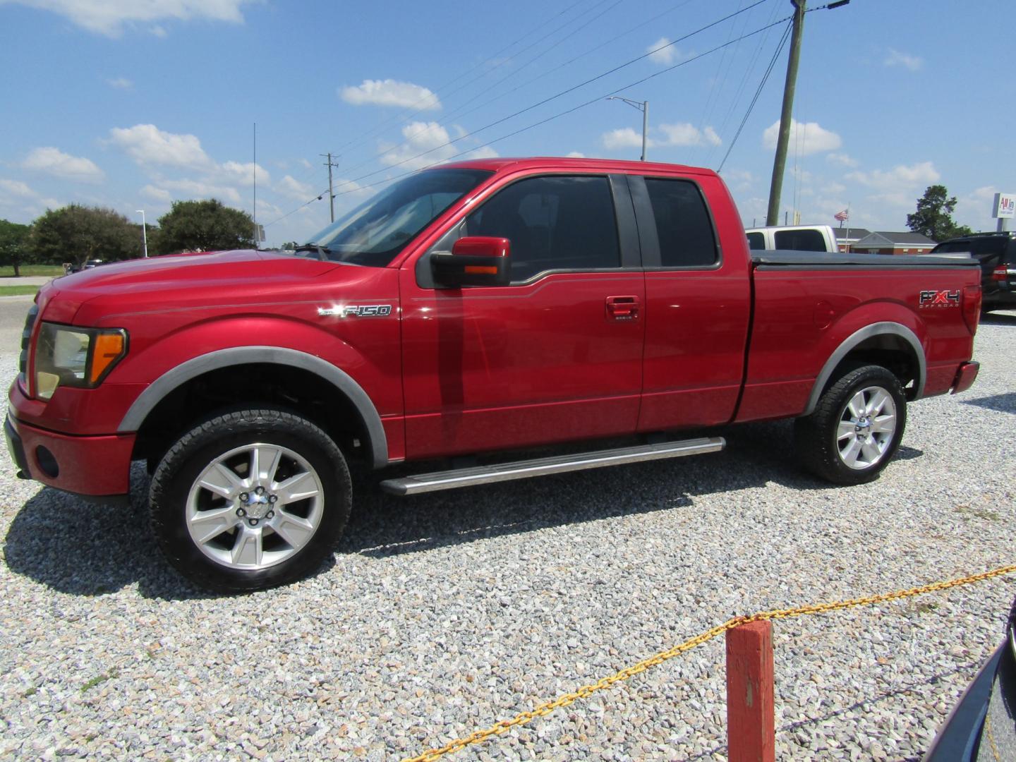 2010 Red Ford F-150 FX4 SuperCab 6.5-ft. Bed 4WD (1FTFX1EV3AK) with an 5.4L V8 SOHC 24V FFV engine, Automatic transmission, located at 15016 S Hwy 231, Midland City, AL, 36350, (334) 983-3001, 31.306210, -85.495277 - Photo#3