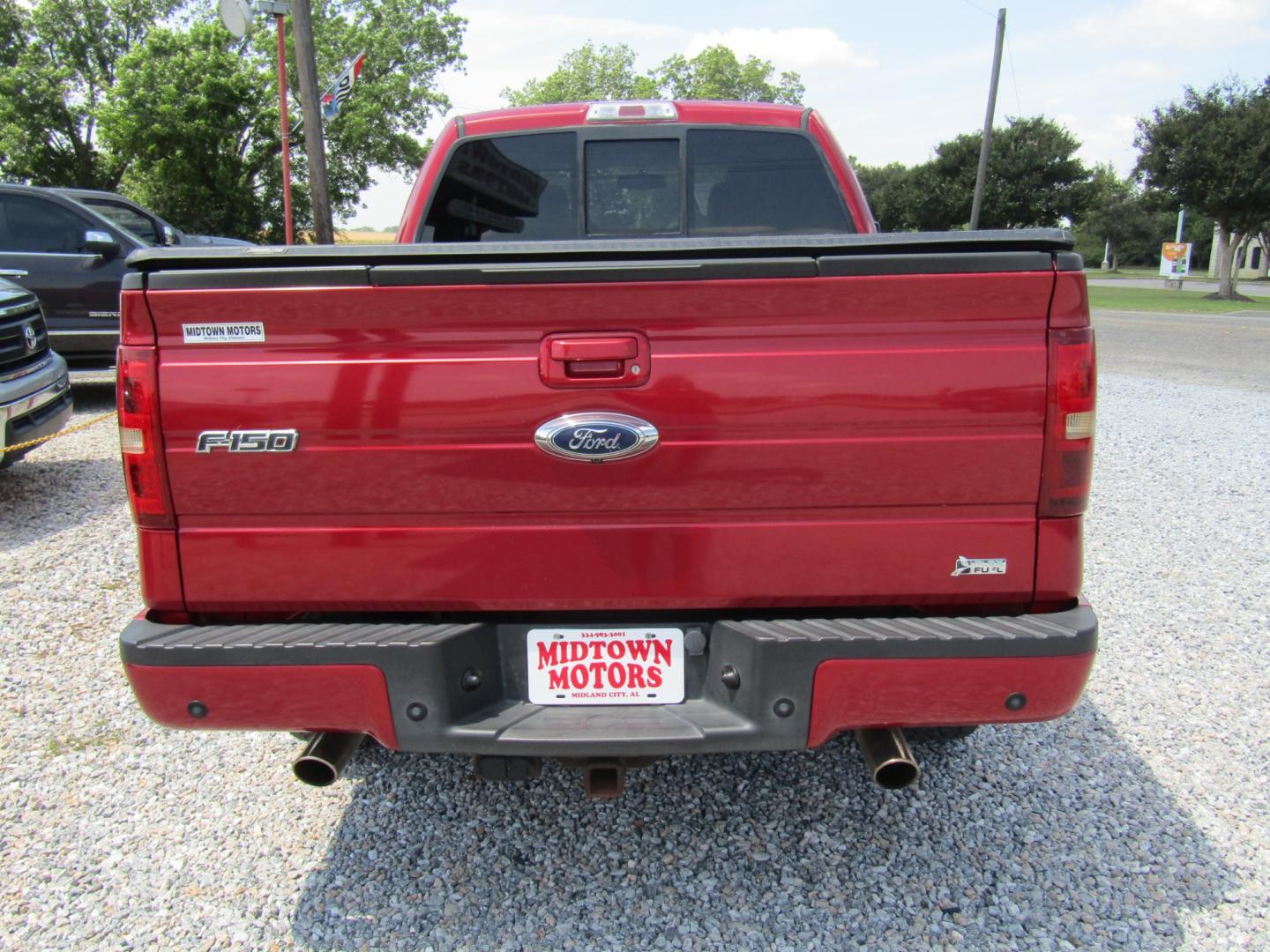 2010 Red Ford F-150 FX4 SuperCab 6.5-ft. Bed 4WD (1FTFX1EV3AK) with an 5.4L V8 SOHC 24V FFV engine, Automatic transmission, located at 15016 S Hwy 231, Midland City, AL, 36350, (334) 983-3001, 31.306210, -85.495277 - Photo#7