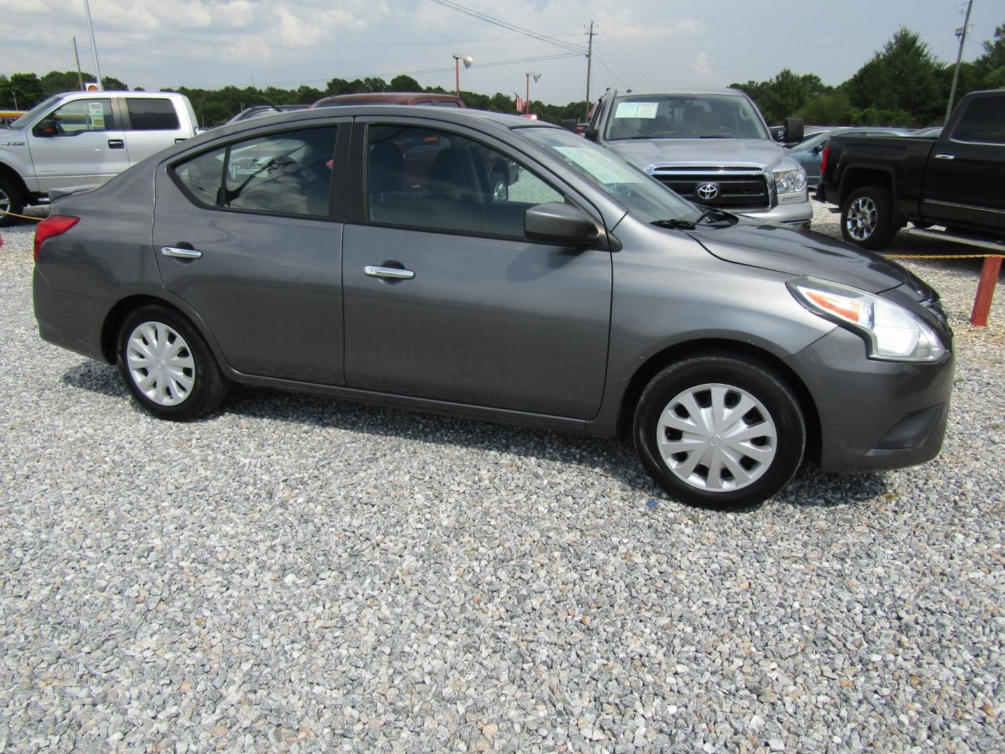 2016 Gray /Gray Nissan Versa 1.6 S 5M (3N1CN7AP6GL) with an 1.6L L4 DOHC 16V engine, Automatic transmission, located at 15016 S Hwy 231, Midland City, AL, 36350, (334) 983-3001, 31.306210, -85.495277 - Photo#0