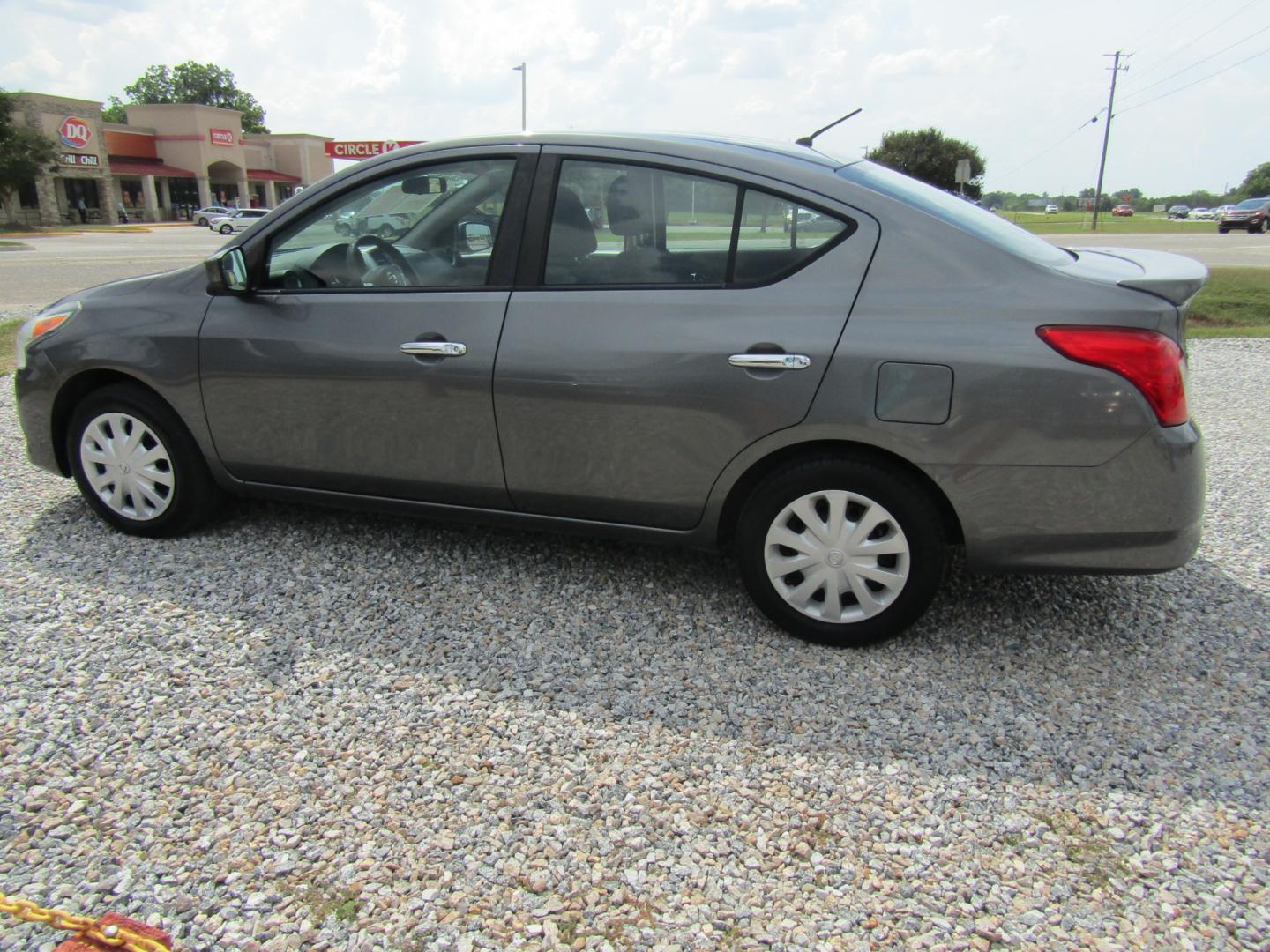 2016 Gray /Gray Nissan Versa 1.6 S 5M (3N1CN7AP6GL) with an 1.6L L4 DOHC 16V engine, Automatic transmission, located at 15016 S Hwy 231, Midland City, AL, 36350, (334) 983-3001, 31.306210, -85.495277 - Photo#5