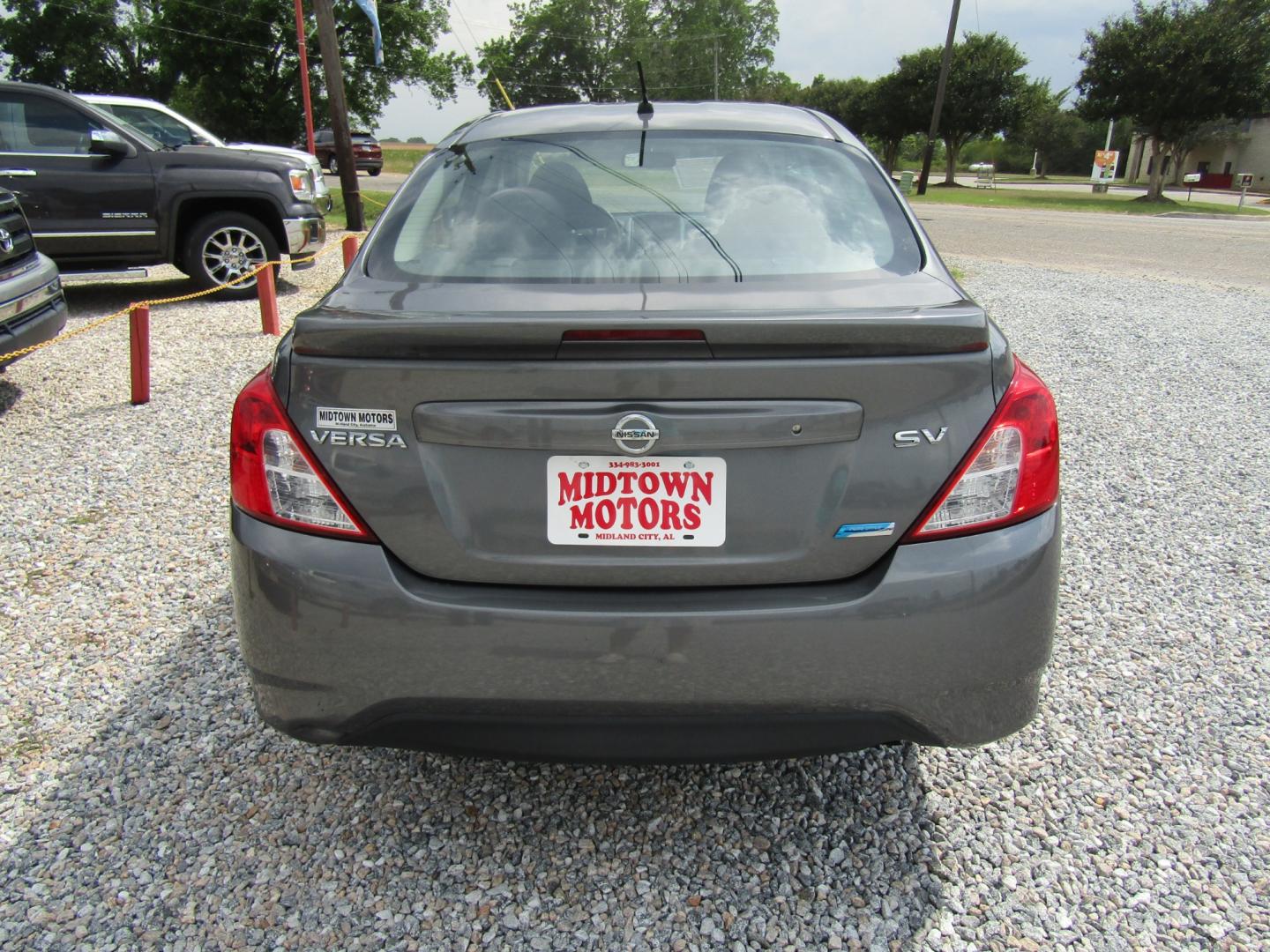 2016 Gray /Gray Nissan Versa 1.6 S 5M (3N1CN7AP6GL) with an 1.6L L4 DOHC 16V engine, Automatic transmission, located at 15016 S Hwy 231, Midland City, AL, 36350, (334) 983-3001, 31.306210, -85.495277 - Photo#6