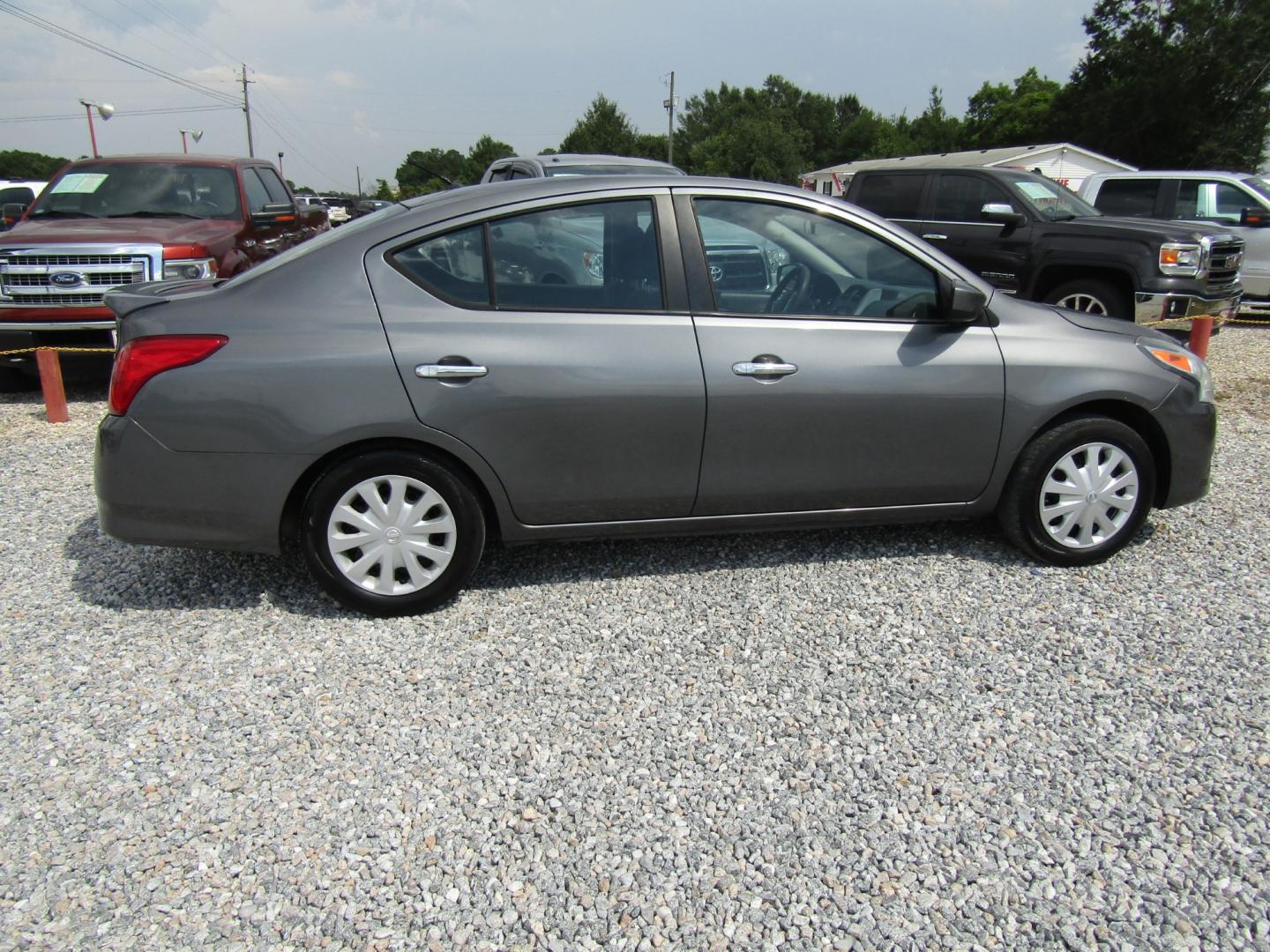 2016 Gray /Gray Nissan Versa 1.6 S 5M (3N1CN7AP6GL) with an 1.6L L4 DOHC 16V engine, Automatic transmission, located at 15016 S Hwy 231, Midland City, AL, 36350, (334) 983-3001, 31.306210, -85.495277 - Photo#7