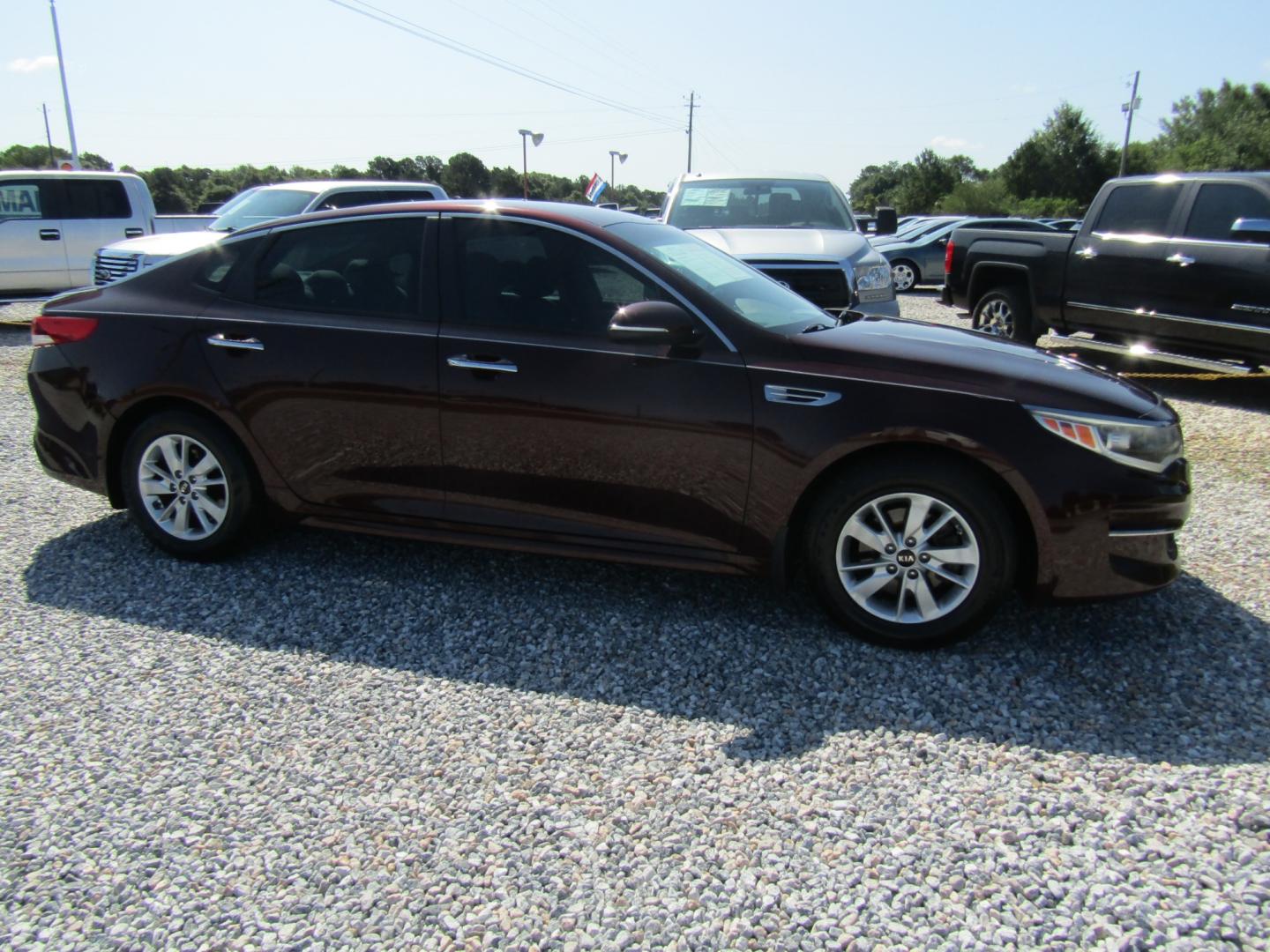 2016 Maroon /Tan Kia Optima LX (5XXGT4L35GG) with an 2.4L L4 DOHC 16V engine, Automatic transmission, located at 15016 S Hwy 231, Midland City, AL, 36350, (334) 983-3001, 31.306210, -85.495277 - Photo#0