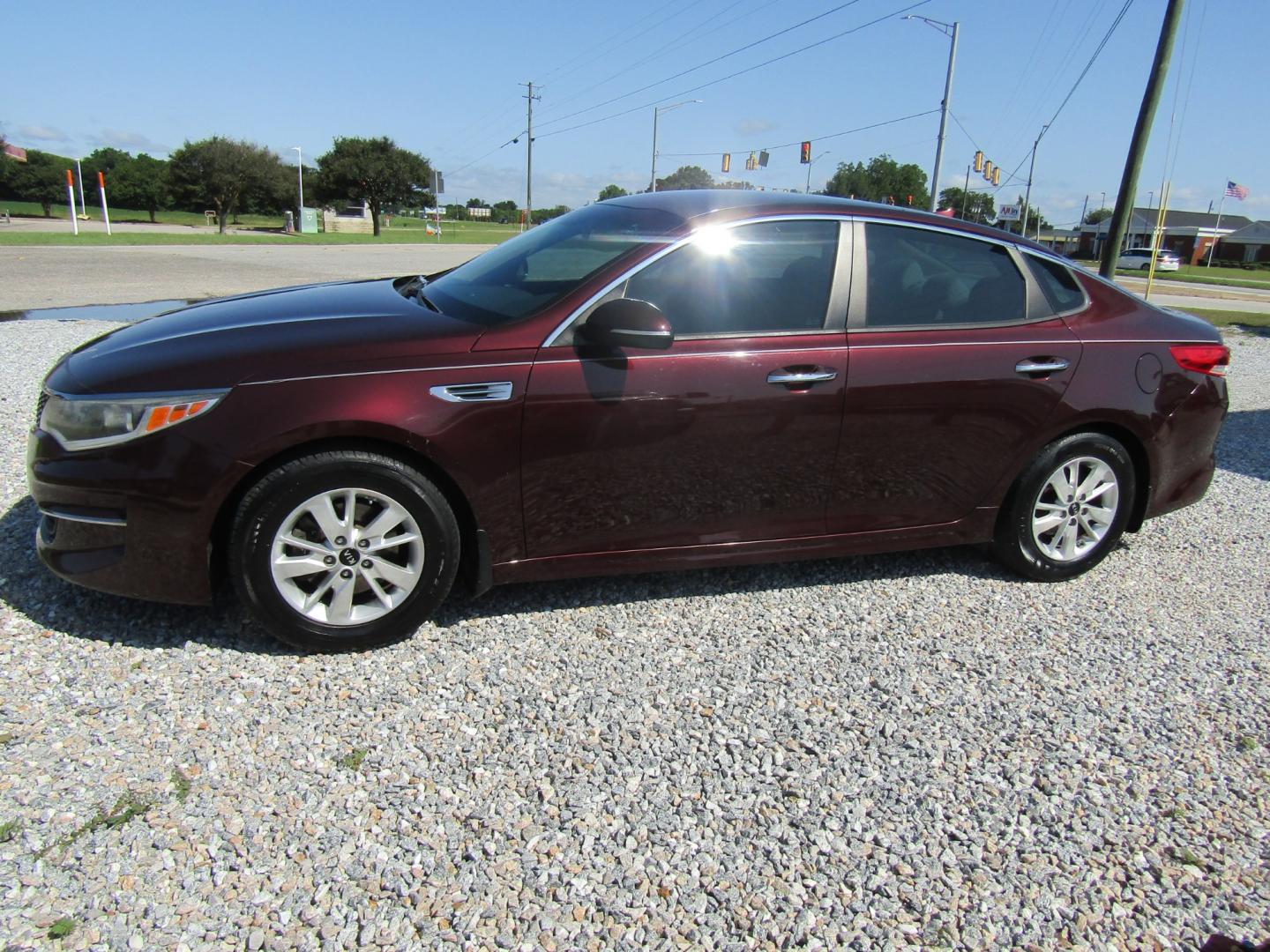 2016 Maroon /Tan Kia Optima LX (5XXGT4L35GG) with an 2.4L L4 DOHC 16V engine, Automatic transmission, located at 15016 S Hwy 231, Midland City, AL, 36350, (334) 983-3001, 31.306210, -85.495277 - Photo#2