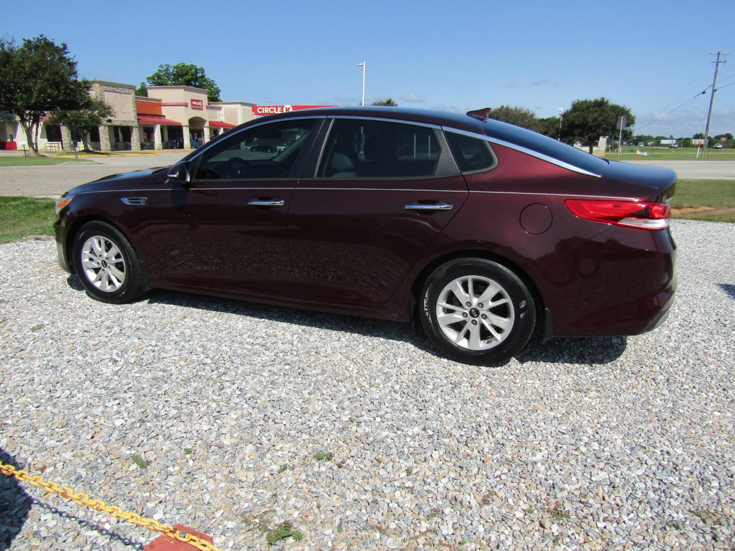 2016 Maroon /Tan Kia Optima LX (5XXGT4L35GG) with an 2.4L L4 DOHC 16V engine, Automatic transmission, located at 15016 S Hwy 231, Midland City, AL, 36350, (334) 983-3001, 31.306210, -85.495277 - Photo#5