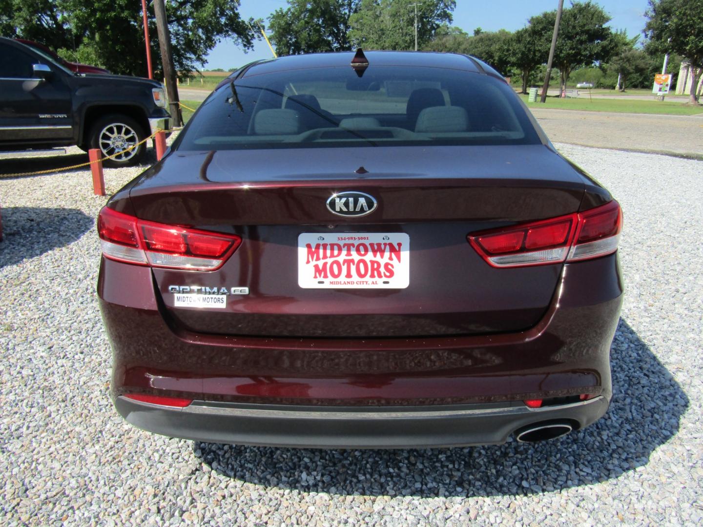 2016 Maroon /Tan Kia Optima LX (5XXGT4L35GG) with an 2.4L L4 DOHC 16V engine, Automatic transmission, located at 15016 S Hwy 231, Midland City, AL, 36350, (334) 983-3001, 31.306210, -85.495277 - Photo#6