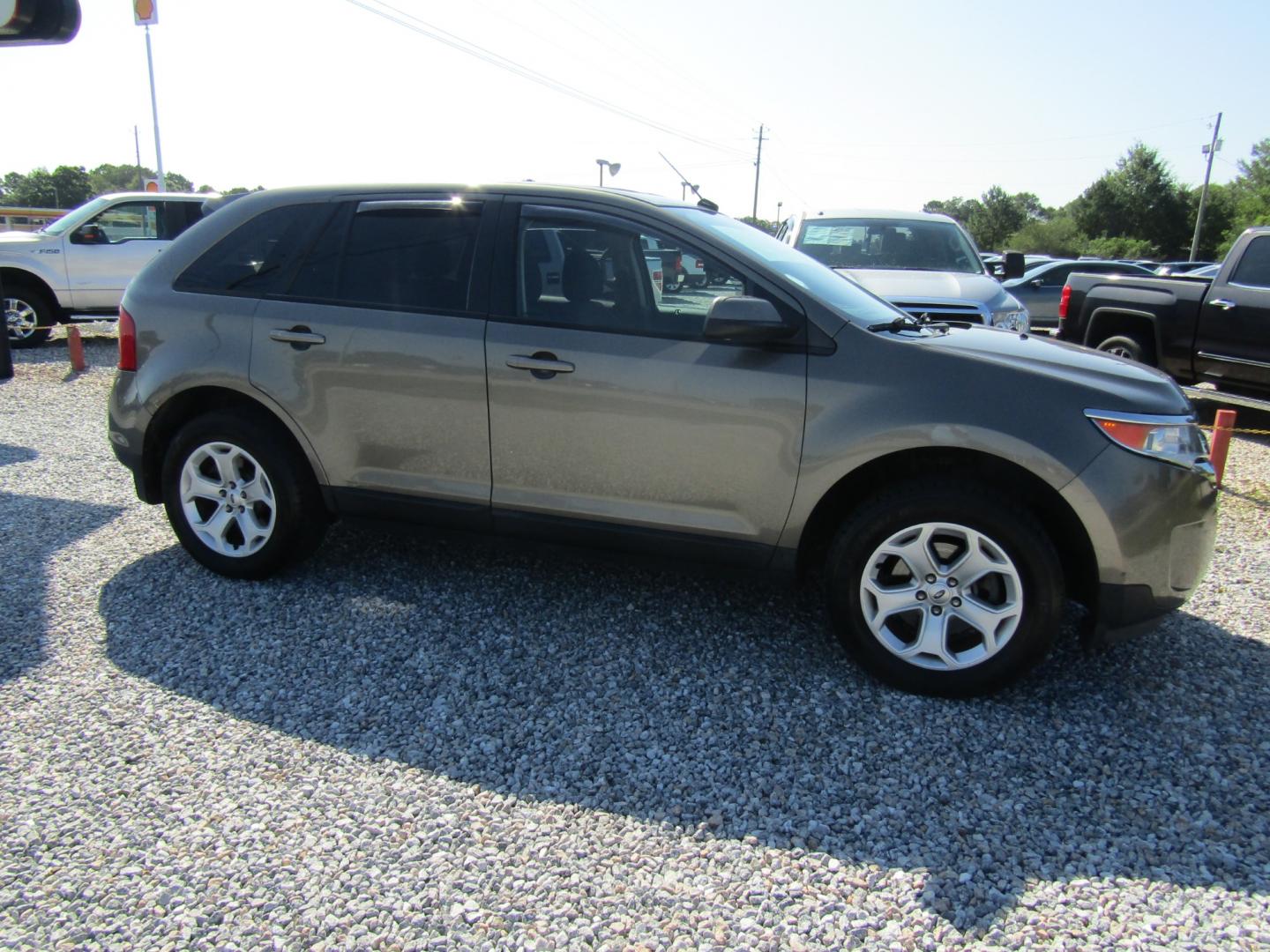 2013 Brown Ford Edge SEL FWD (2FMDK3JC2DB) with an 3.5L V6 DOHC 24V engine, Automatic transmission, located at 15016 S Hwy 231, Midland City, AL, 36350, (334) 983-3001, 31.306210, -85.495277 - Photo#0