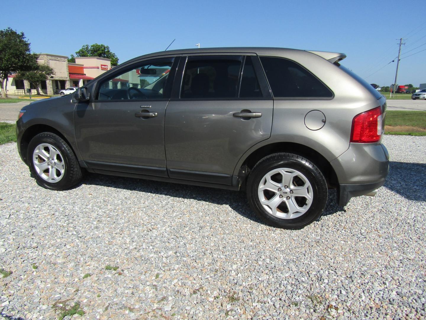 2013 Brown Ford Edge SEL FWD (2FMDK3JC2DB) with an 3.5L V6 DOHC 24V engine, Automatic transmission, located at 15016 S Hwy 231, Midland City, AL, 36350, (334) 983-3001, 31.306210, -85.495277 - Photo#5