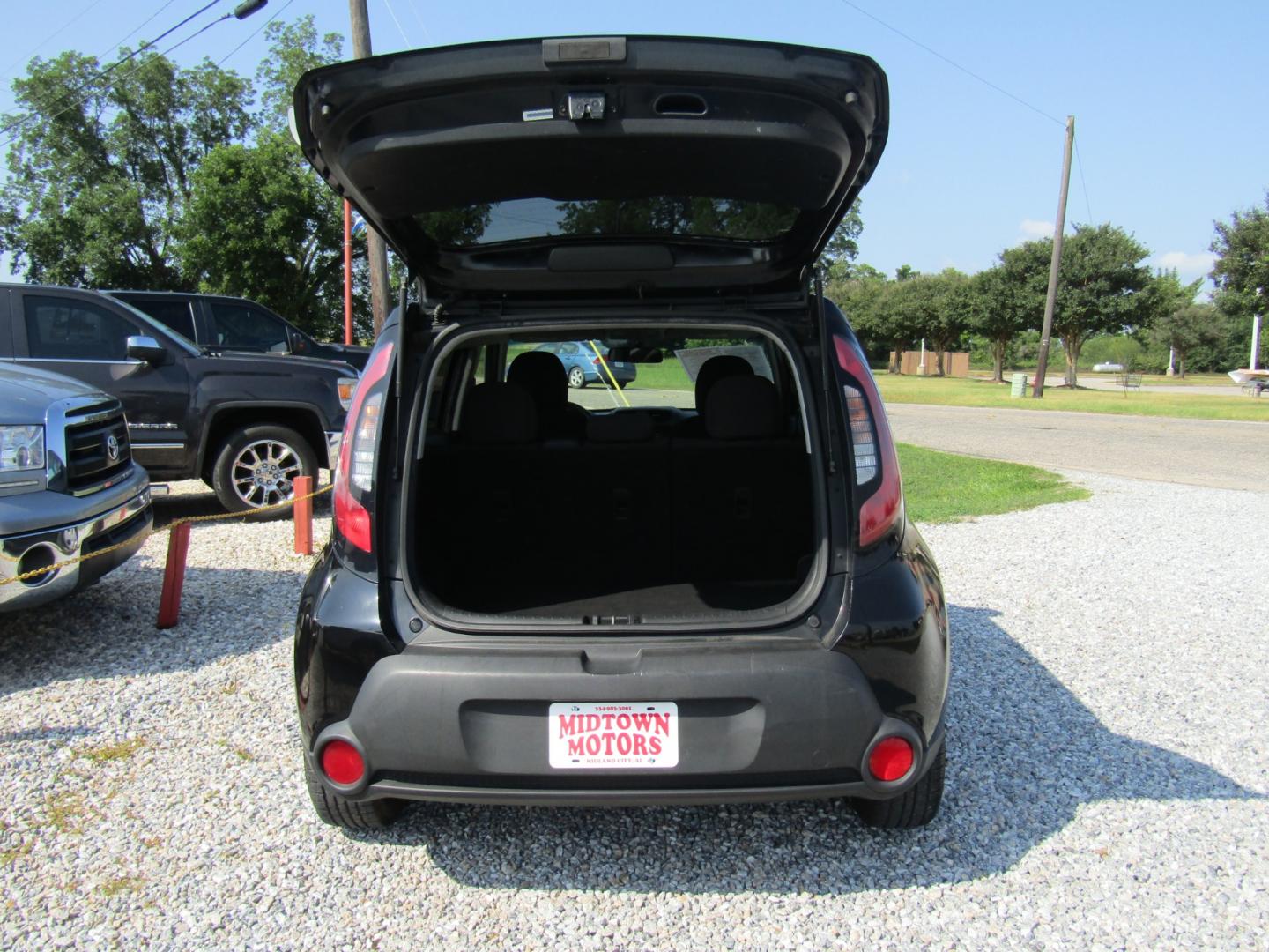 2014 Black Kia Soul Base (KNDJN2A22E7) with an 1.6L L4 DOHC 16V engine, Automatic transmission, located at 15016 S Hwy 231, Midland City, AL, 36350, (334) 983-3001, 31.306210, -85.495277 - Photo#7