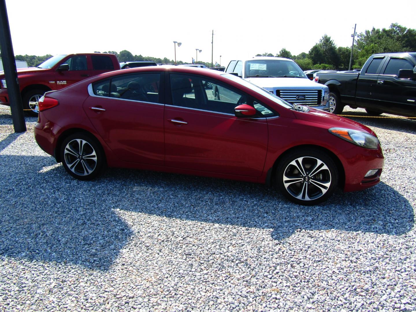 2014 Red Kia Forte EX (KNAFX4A80E5) with an 2.0L L4 DOHC 16V engine, Automatic transmission, located at 15016 S Hwy 231, Midland City, AL, 36350, (334) 983-3001, 31.306210, -85.495277 - Photo#0