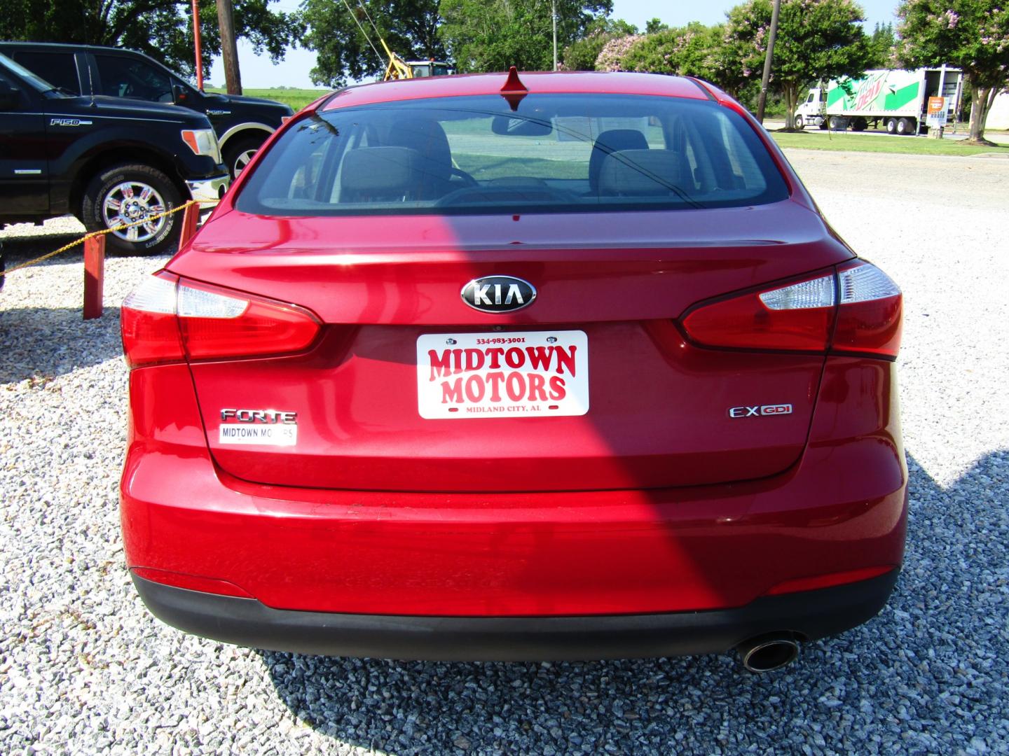 2014 Red Kia Forte EX (KNAFX4A80E5) with an 2.0L L4 DOHC 16V engine, Automatic transmission, located at 15016 S Hwy 231, Midland City, AL, 36350, (334) 983-3001, 31.306210, -85.495277 - Photo#6