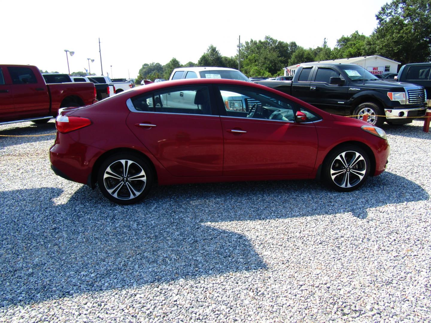 2014 Red Kia Forte EX (KNAFX4A80E5) with an 2.0L L4 DOHC 16V engine, Automatic transmission, located at 15016 S Hwy 231, Midland City, AL, 36350, (334) 983-3001, 31.306210, -85.495277 - Photo#7