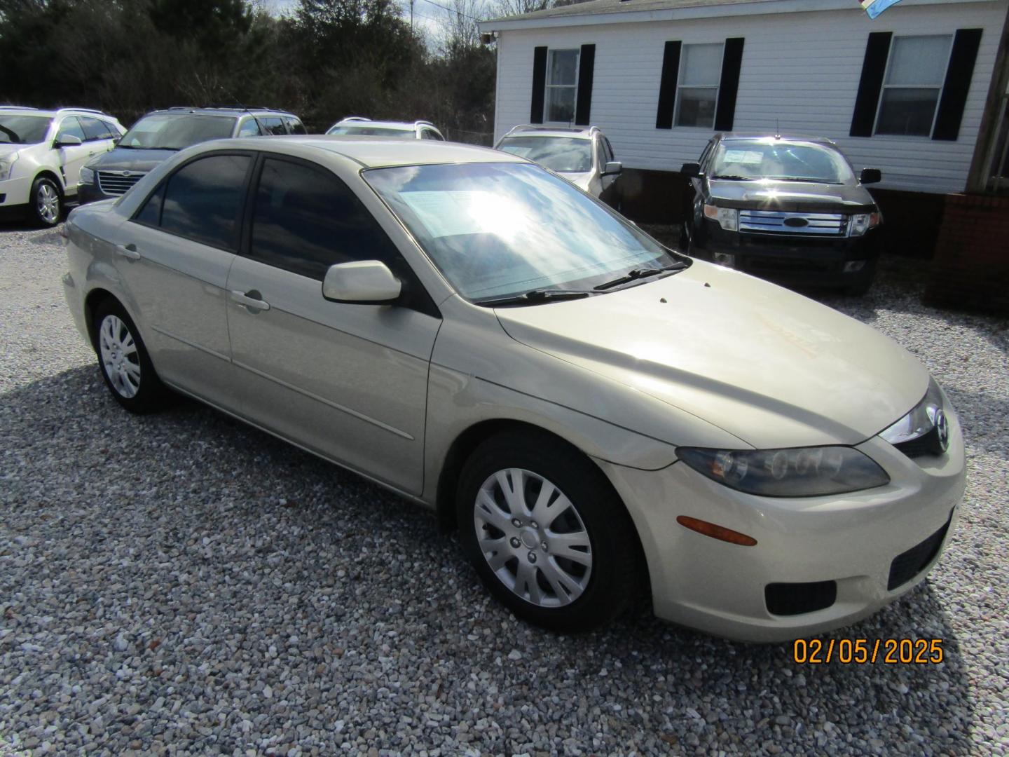 2006 Gold /Tan Mazda MAZDA6 i Sports Sedan (1YVFP80C465) with an 2.3L L4 DOHC 16V engine, Automatic transmission, located at 15016 S Hwy 231, Midland City, AL, 36350, (334) 983-3001, 31.306210, -85.495277 - Photo#0