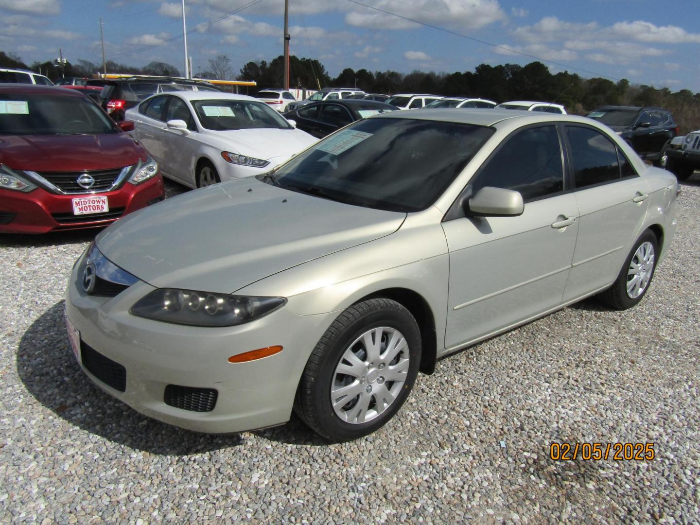 2006 Gold /Tan Mazda MAZDA6 i Sports Sedan (1YVFP80C465) with an 2.3L L4 DOHC 16V engine, Automatic transmission, located at 15016 S Hwy 231, Midland City, AL, 36350, (334) 983-3001, 31.306210, -85.495277 - Photo#1