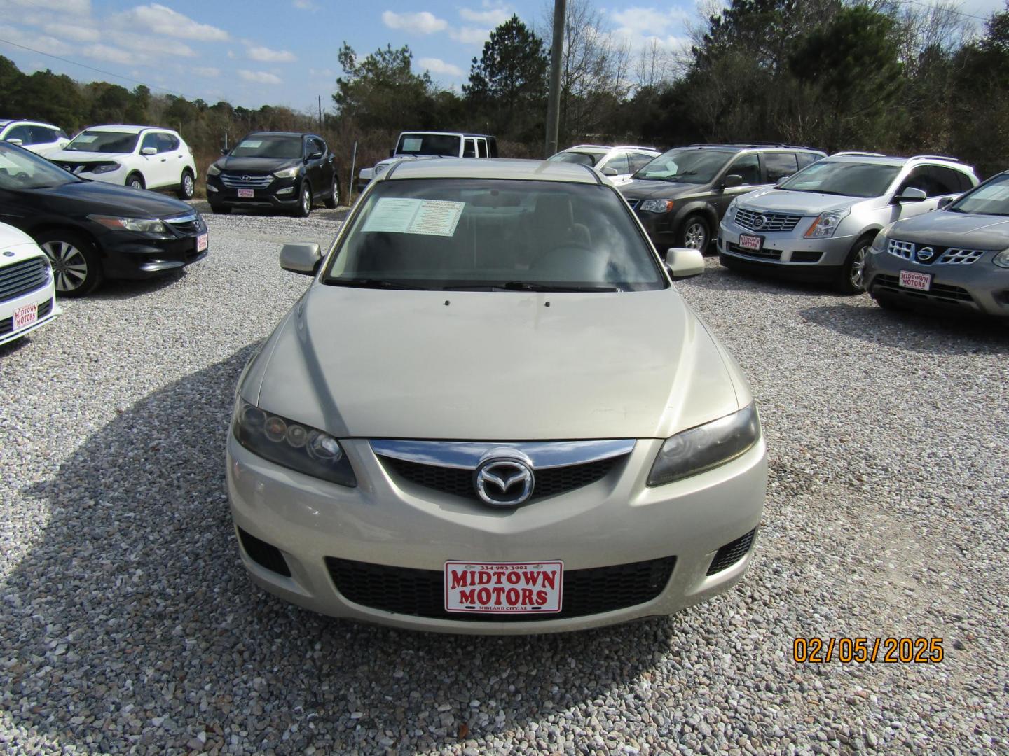 2006 Gold /Tan Mazda MAZDA6 i Sports Sedan (1YVFP80C465) with an 2.3L L4 DOHC 16V engine, Automatic transmission, located at 15016 S Hwy 231, Midland City, AL, 36350, (334) 983-3001, 31.306210, -85.495277 - Photo#3