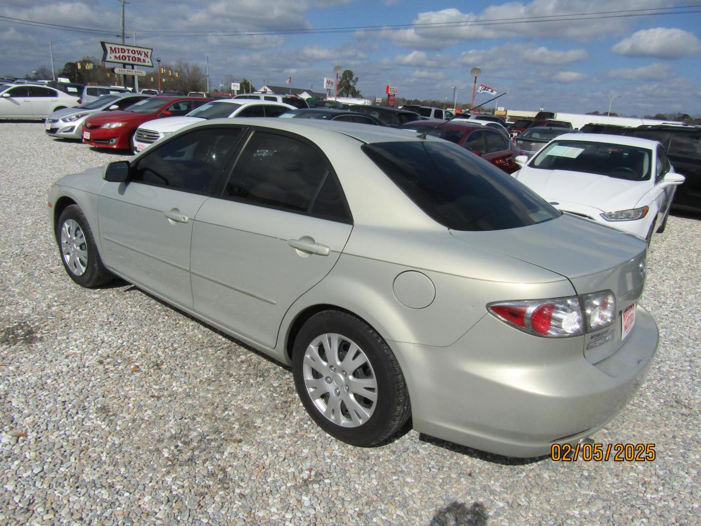 2006 Gold /Tan Mazda MAZDA6 i Sports Sedan (1YVFP80C465) with an 2.3L L4 DOHC 16V engine, Automatic transmission, located at 15016 S Hwy 231, Midland City, AL, 36350, (334) 983-3001, 31.306210, -85.495277 - Photo#5