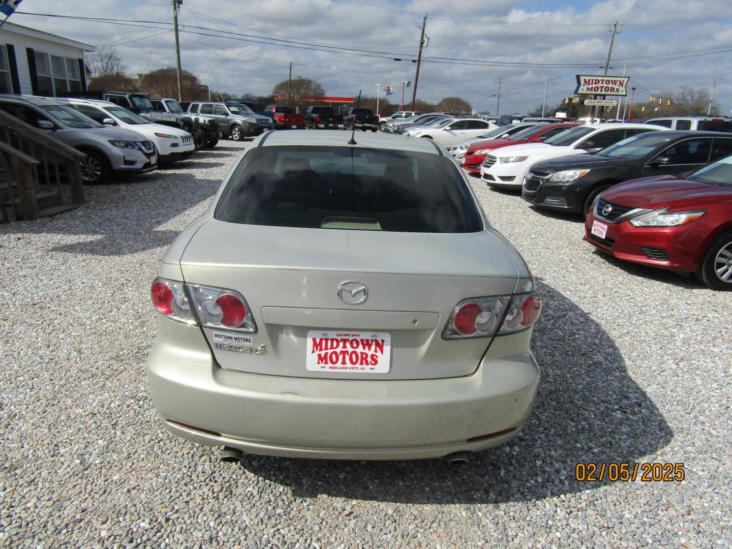 2006 Gold /Tan Mazda MAZDA6 i Sports Sedan (1YVFP80C465) with an 2.3L L4 DOHC 16V engine, Automatic transmission, located at 15016 S Hwy 231, Midland City, AL, 36350, (334) 983-3001, 31.306210, -85.495277 - Photo#7