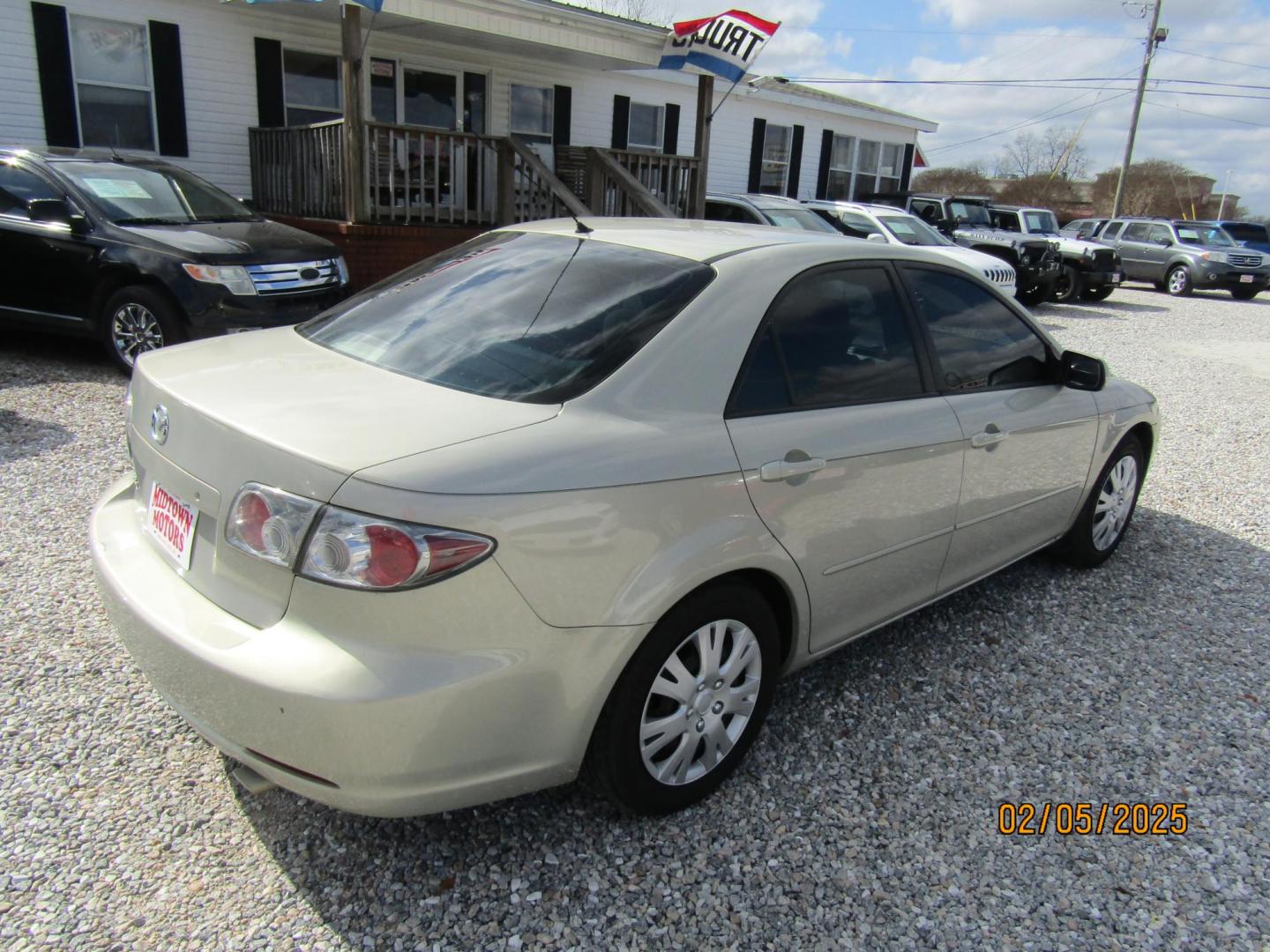 2006 Gold /Tan Mazda MAZDA6 i Sports Sedan (1YVFP80C465) with an 2.3L L4 DOHC 16V engine, Automatic transmission, located at 15016 S Hwy 231, Midland City, AL, 36350, (334) 983-3001, 31.306210, -85.495277 - Photo#8