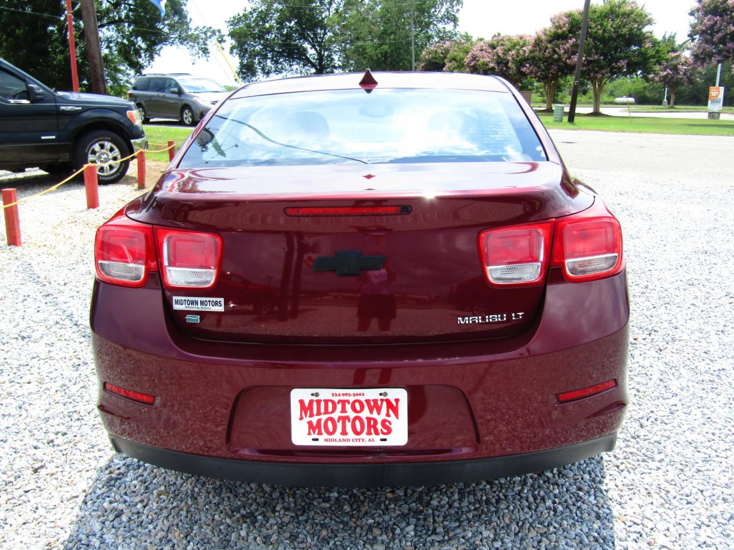 2014 Red /Gray Chevrolet Malibu 1LT (1G11C5SL5EF) with an 2.5L L4 DOHC 16V engine, Automatic transmission, located at 15016 S Hwy 231, Midland City, AL, 36350, (334) 983-3001, 31.306210, -85.495277 - Photo#6