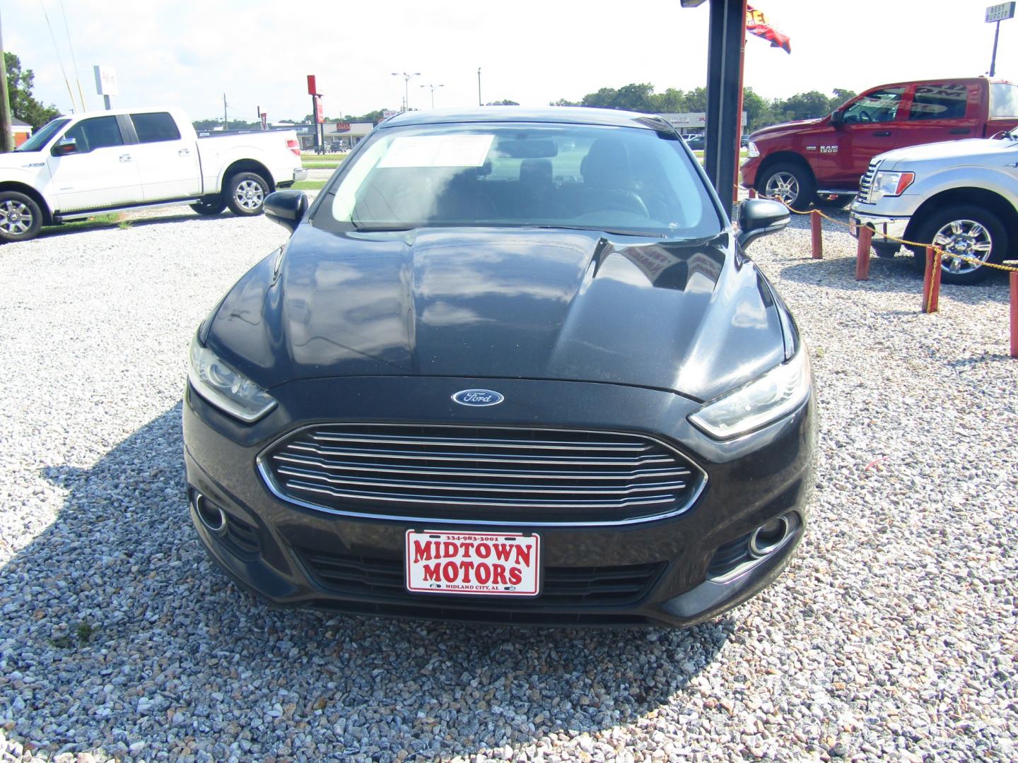 2013 Black /Black Ford Fusion SE (3FA6P0HR8DR) with an 1.6L L4 DOHC 16V engine, Automatic transmission, located at 15016 S Hwy 231, Midland City, AL, 36350, (334) 983-3001, 31.306210, -85.495277 - Photo#1