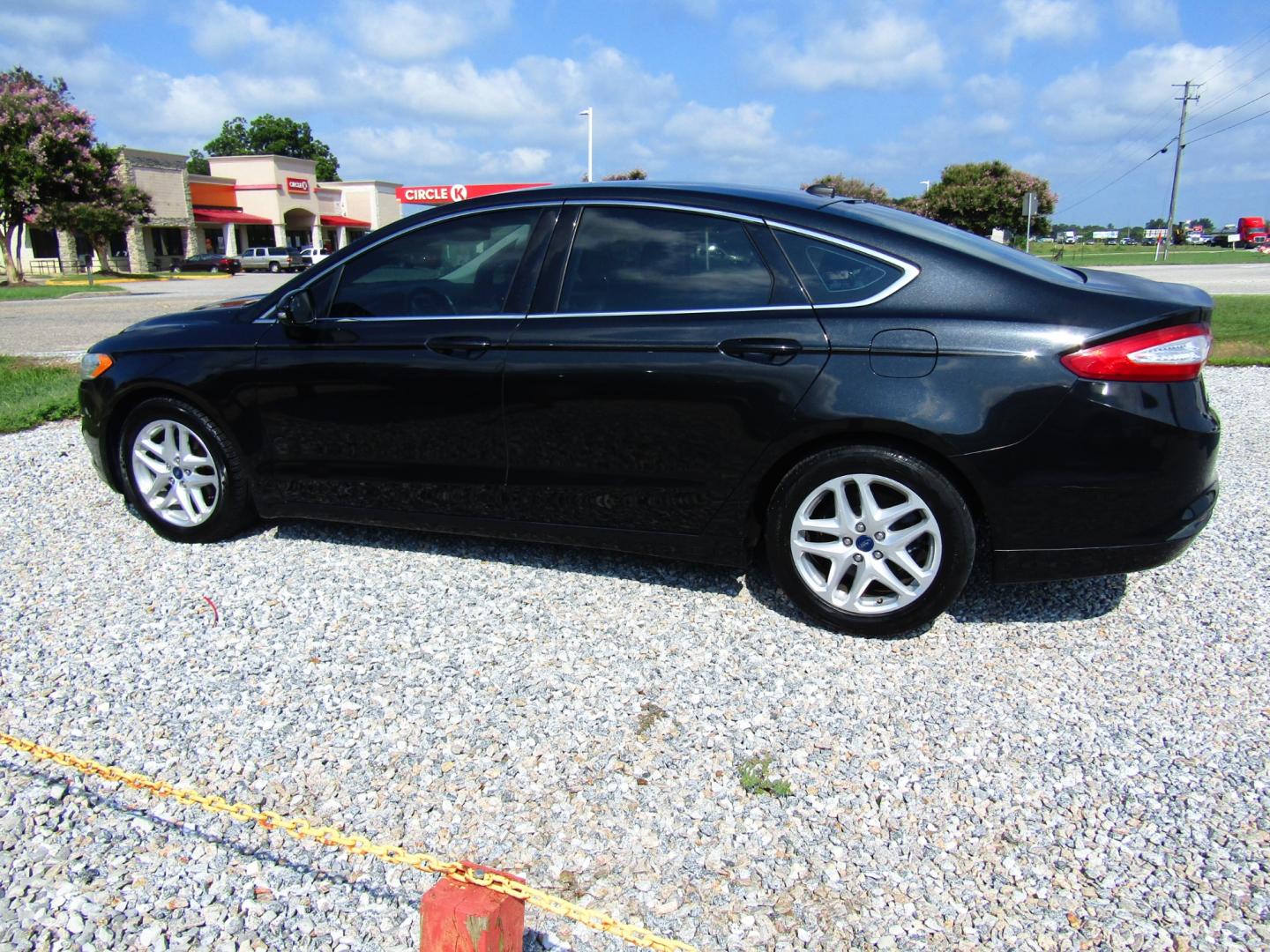 2013 Black /Black Ford Fusion SE (3FA6P0HR8DR) with an 1.6L L4 DOHC 16V engine, Automatic transmission, located at 15016 S Hwy 231, Midland City, AL, 36350, (334) 983-3001, 31.306210, -85.495277 - Photo#5