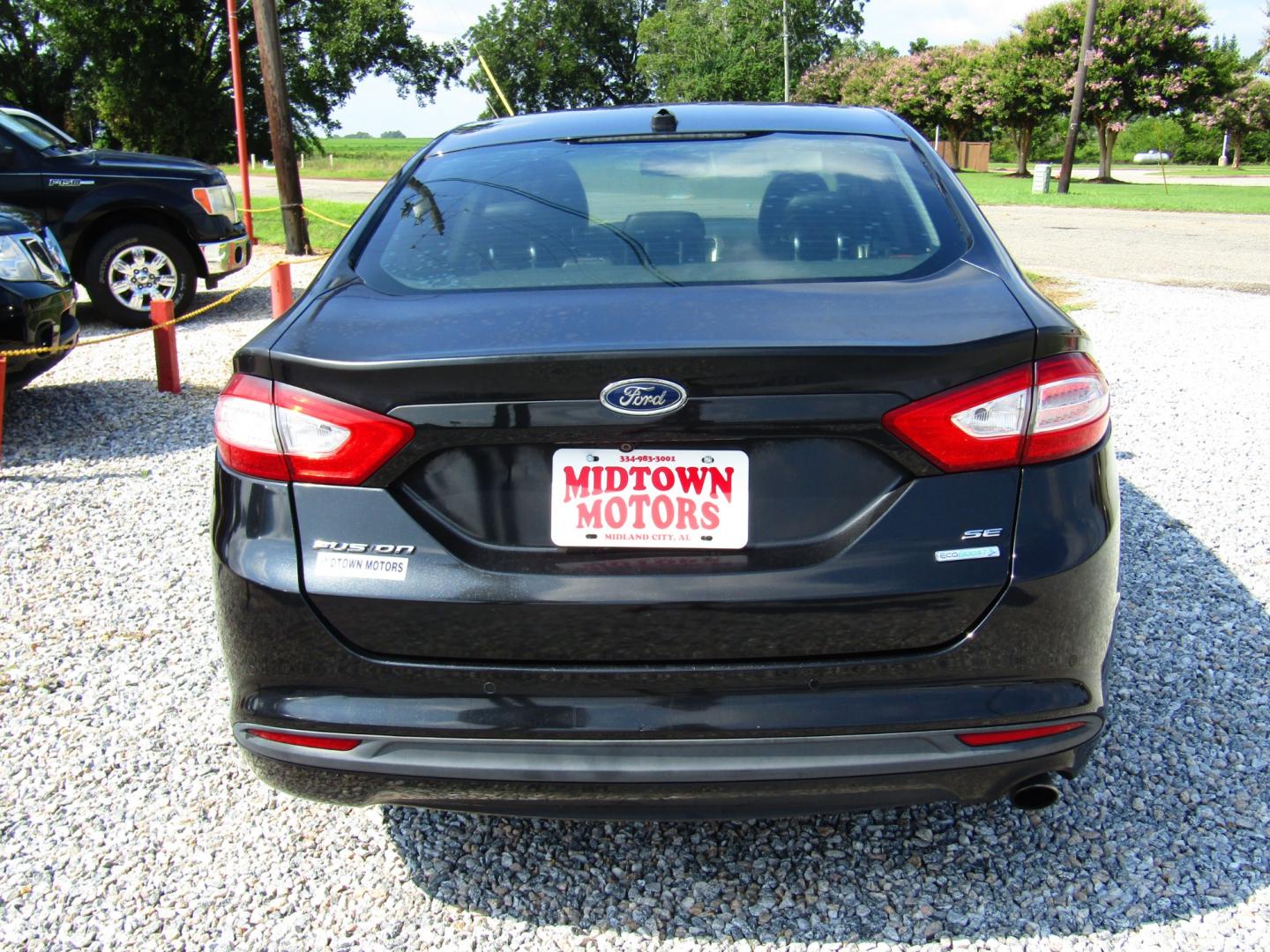 2013 Black /Black Ford Fusion SE (3FA6P0HR8DR) with an 1.6L L4 DOHC 16V engine, Automatic transmission, located at 15016 S Hwy 231, Midland City, AL, 36350, (334) 983-3001, 31.306210, -85.495277 - Photo#6