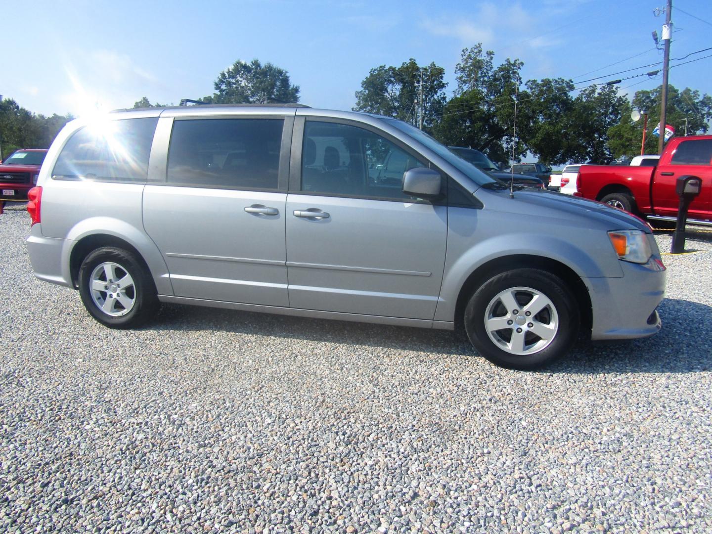 2013 Silver Dodge Grand Caravan SXT (2C4RDGCG7DR) with an 3.6L V6 DOHC 24V engine, Automatic transmission, located at 15016 S Hwy 231, Midland City, AL, 36350, (334) 983-3001, 31.306210, -85.495277 - Photo#0