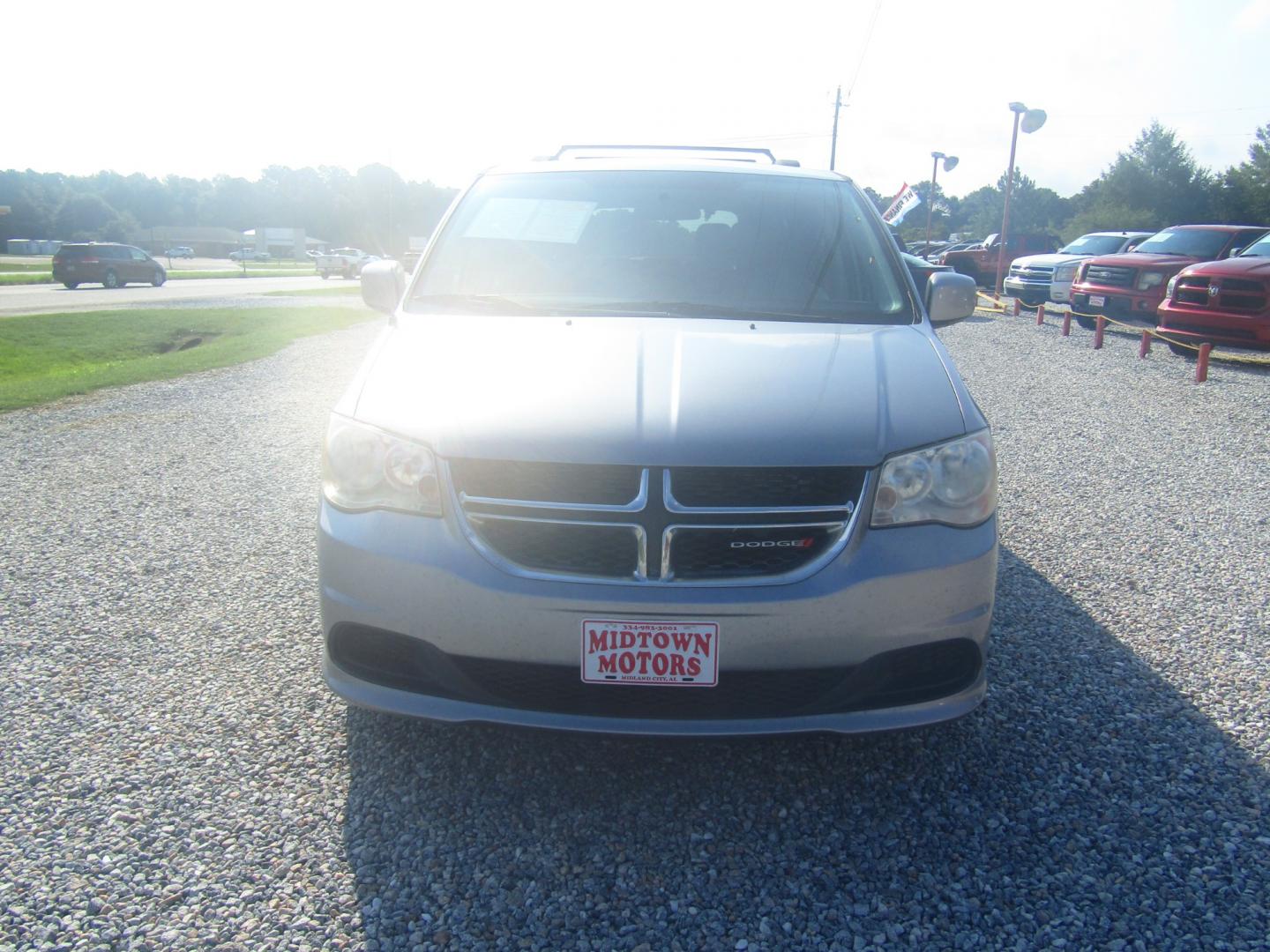 2013 Silver Dodge Grand Caravan SXT (2C4RDGCG7DR) with an 3.6L V6 DOHC 24V engine, Automatic transmission, located at 15016 S Hwy 231, Midland City, AL, 36350, (334) 983-3001, 31.306210, -85.495277 - Photo#1