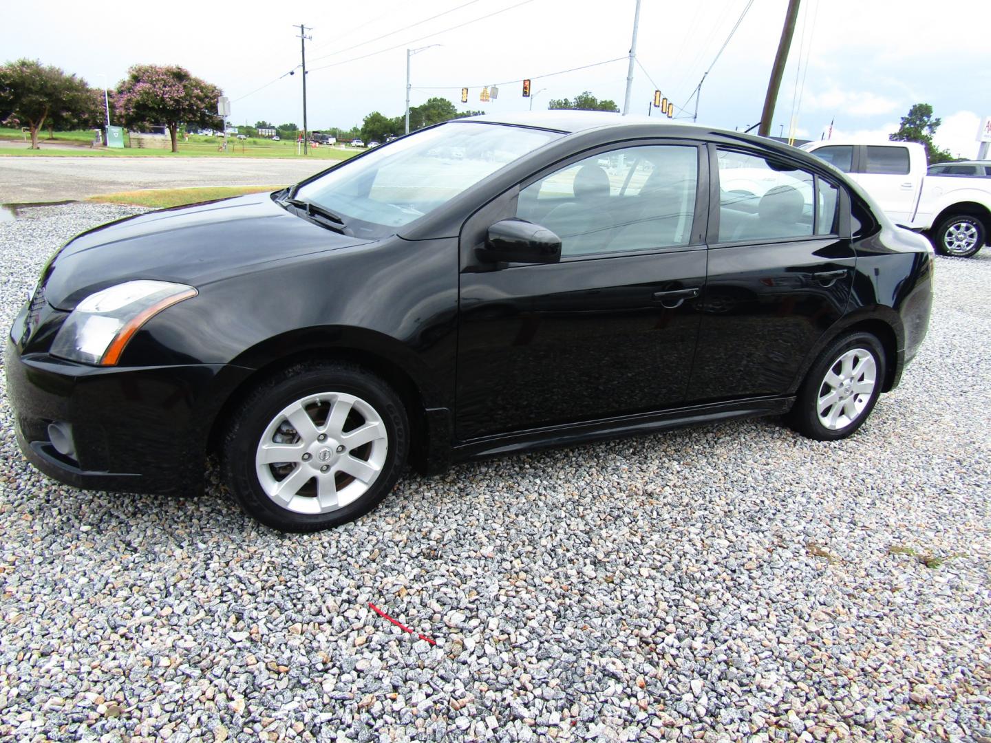 2012 Black /Gray Nissan Sentra 2.0 (3N1AB6AP6CL) with an 2.0L L4 DOHC 16V engine, Automatic transmission, located at 15016 S Hwy 231, Midland City, AL, 36350, (334) 983-3001, 31.306210, -85.495277 - Photo#2