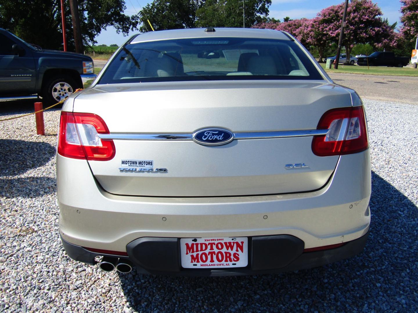 2011 Gold /Tan Ford Taurus SEL FWD (1FAHP2EW4BG) with an 3.5L V6 DOHC 24V engine, Automatic transmission, located at 15016 S Hwy 231, Midland City, AL, 36350, (334) 983-3001, 31.306210, -85.495277 - Photo#6