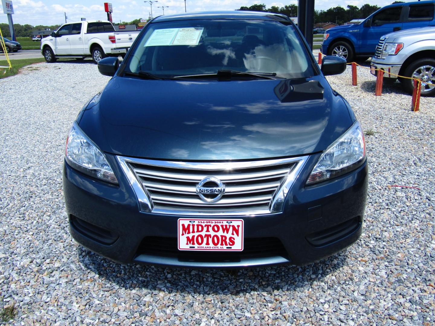 2015 Blue /Black Nissan Sentra S 6MT (3N1AB7AP0FY) with an 1.8L L4 SFI DOHC 16V engine, Automatic transmission, located at 15016 S Hwy 231, Midland City, AL, 36350, (334) 983-3001, 31.306210, -85.495277 - Photo#1